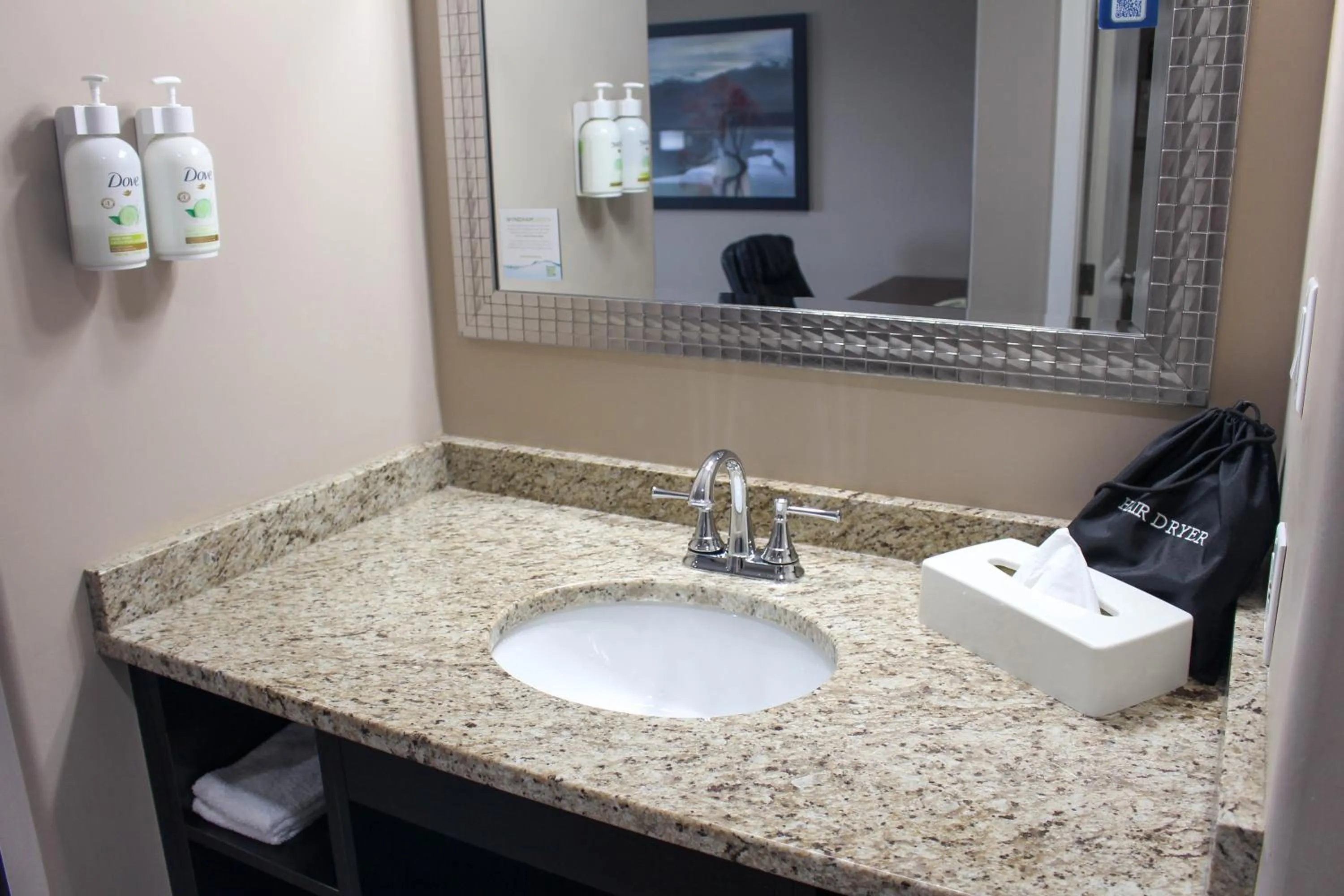 Bathroom in Ramada by Wyndham Sherwood Park