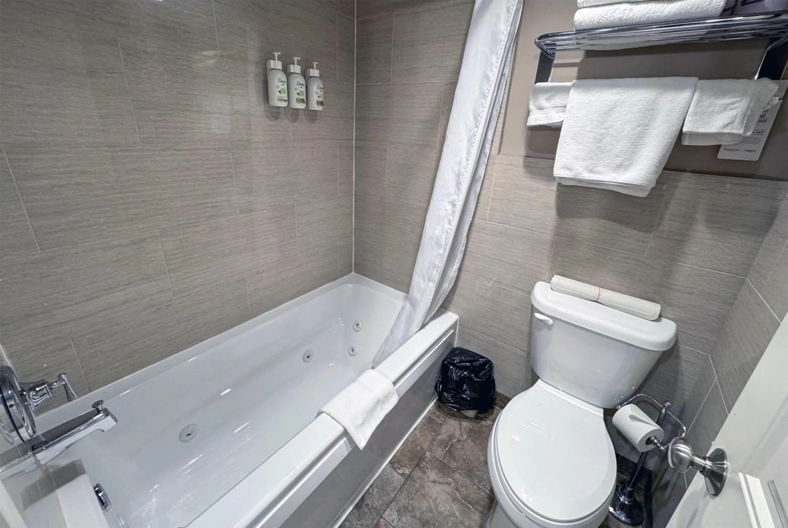 Bathroom in Ramada by Wyndham Sherwood Park