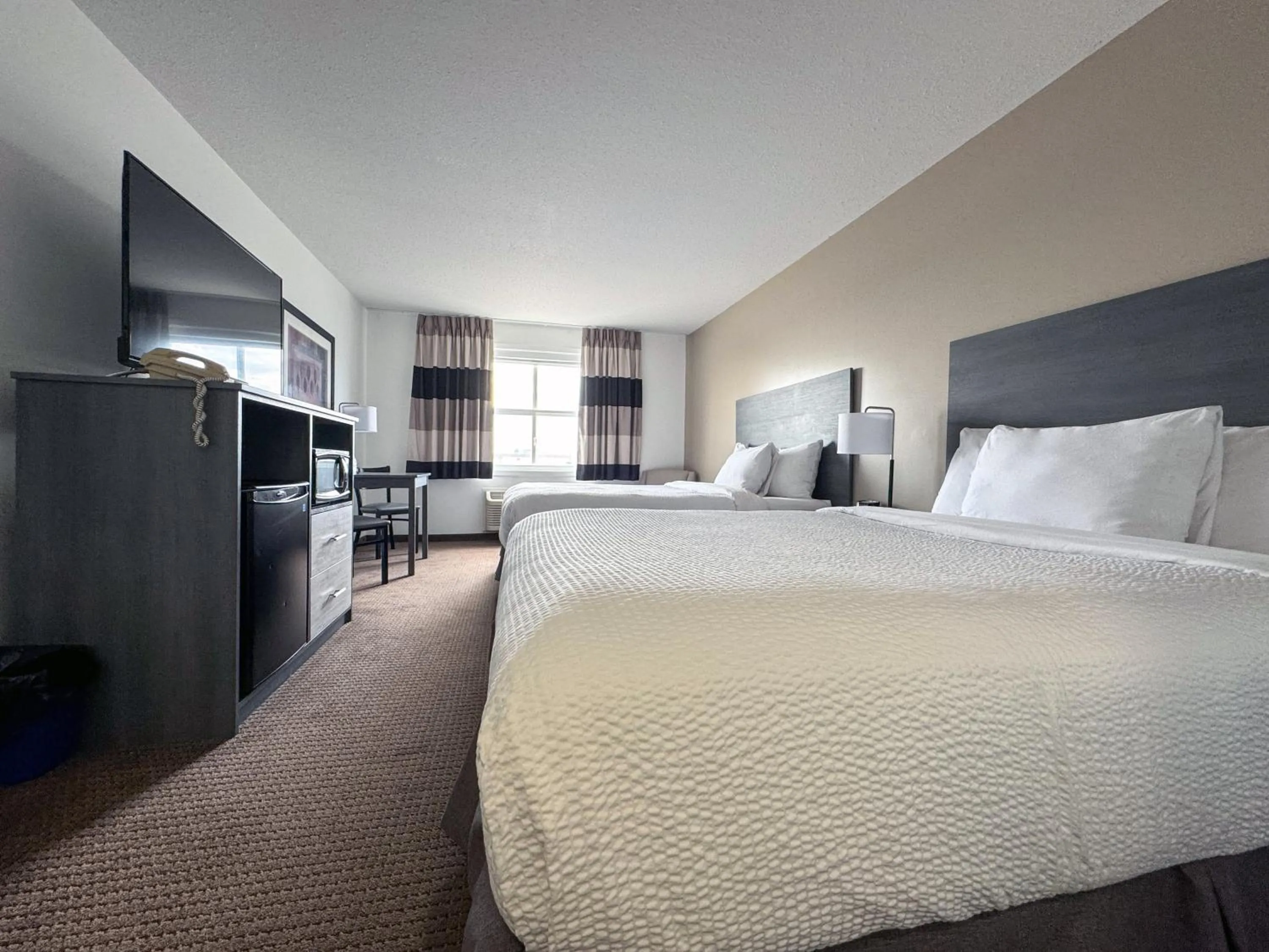 Bed in Ramada by Wyndham Sherwood Park