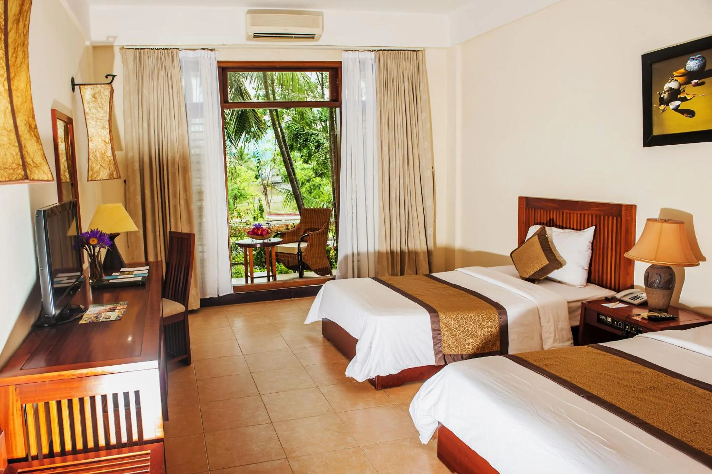 Bed in Sun Spa Resort & Villa