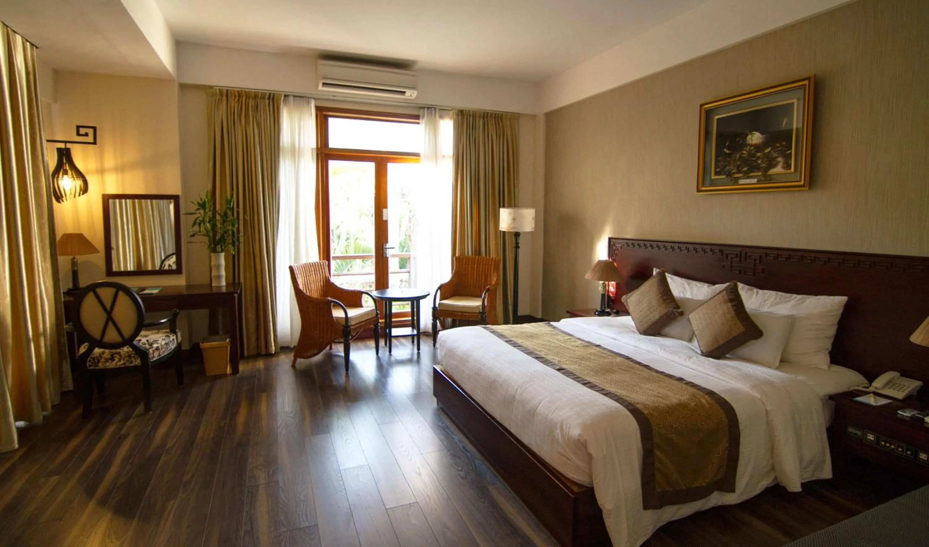 Bed in Sun Spa Resort & Villa