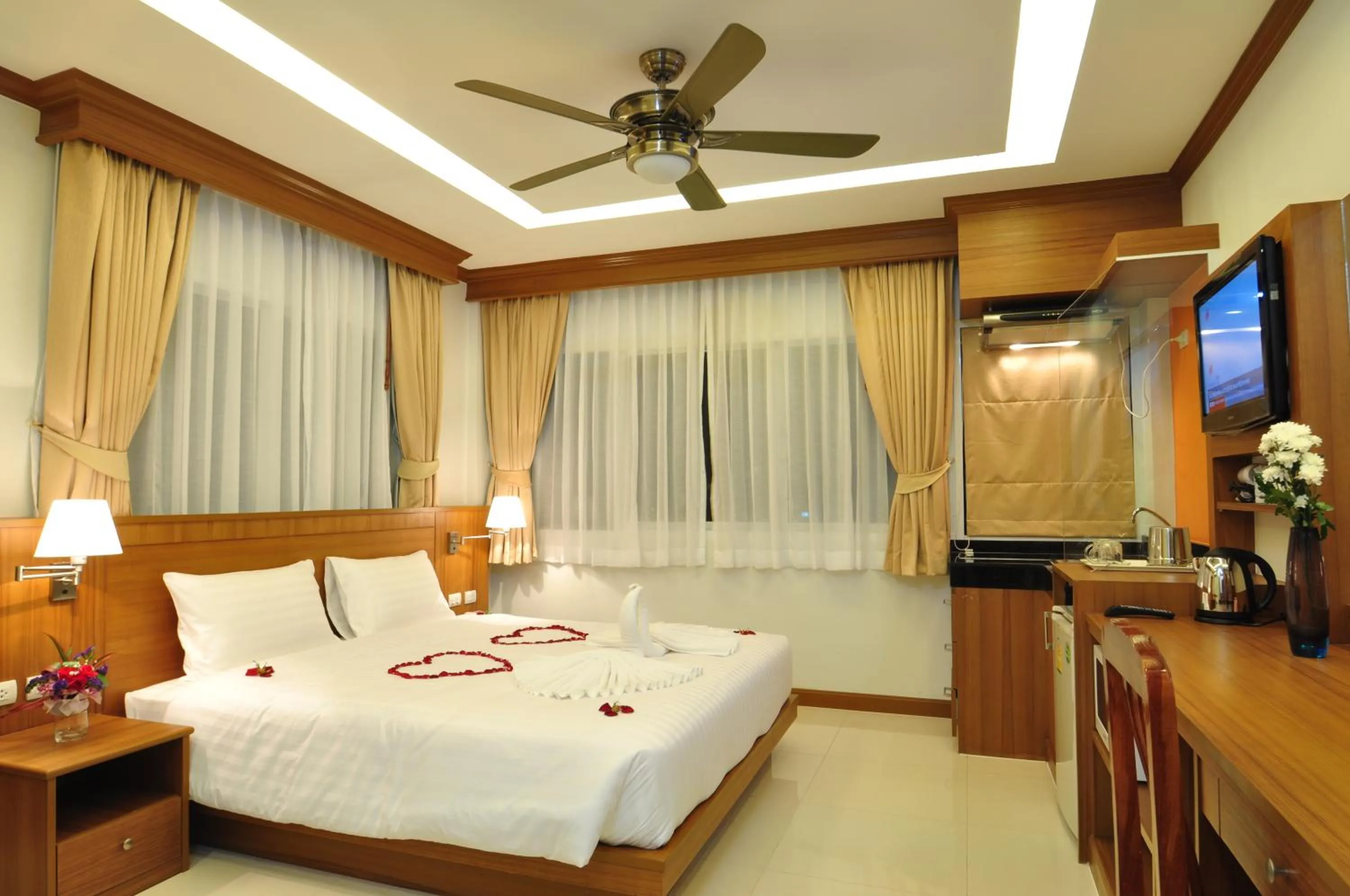 Bedroom, Bed in Green Harbor Hotel & Service Apartment