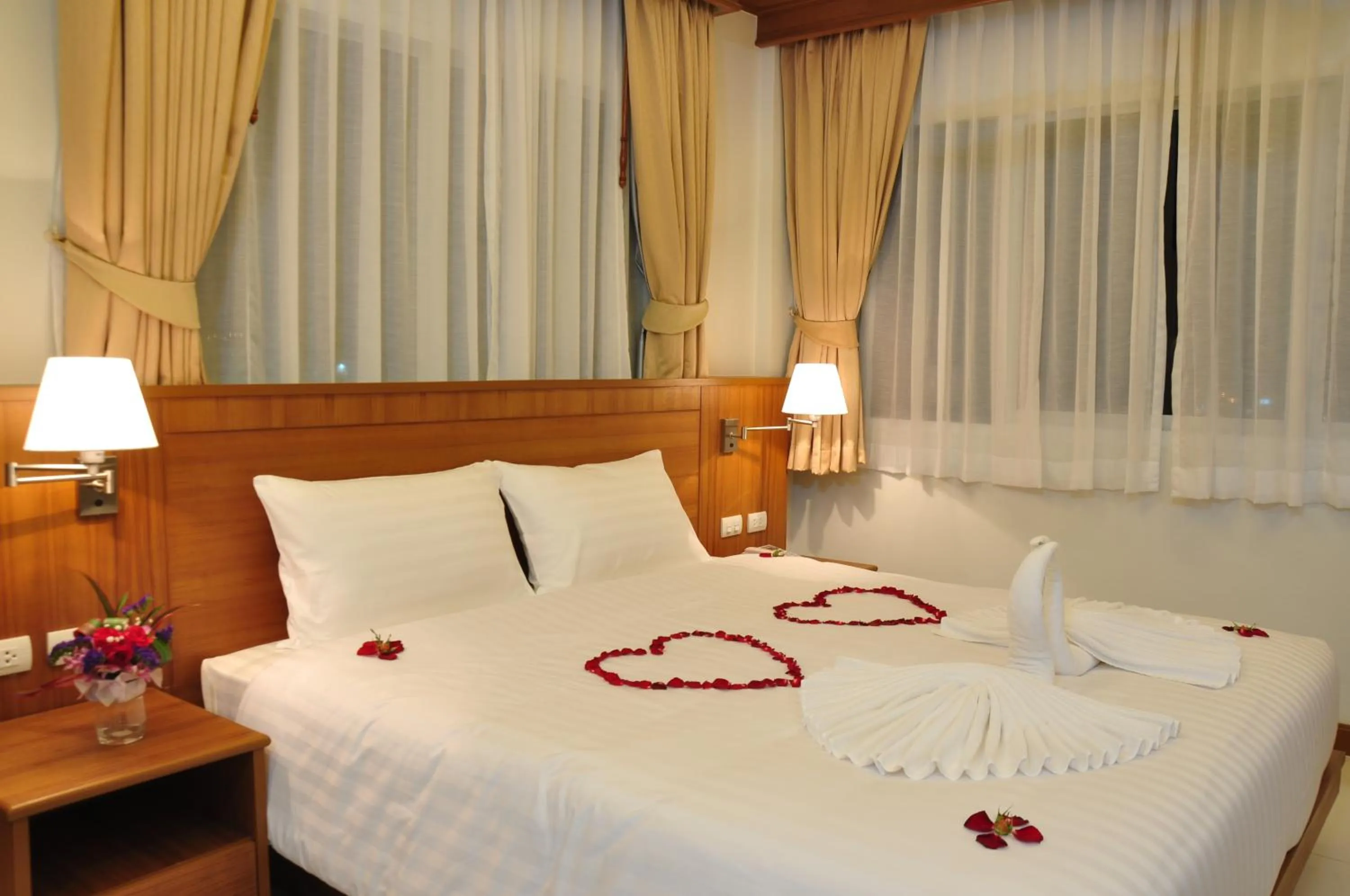 Bedroom, Bed in Green Harbor Hotel & Service Apartment