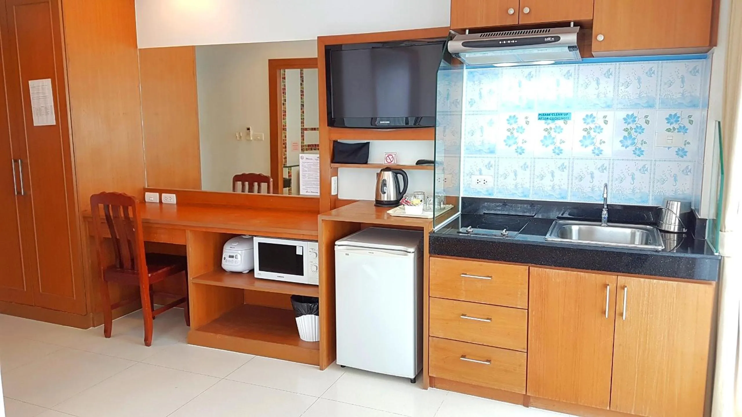 Kitchen or kitchenette in Green Harbor Hotel & Service Apartment
