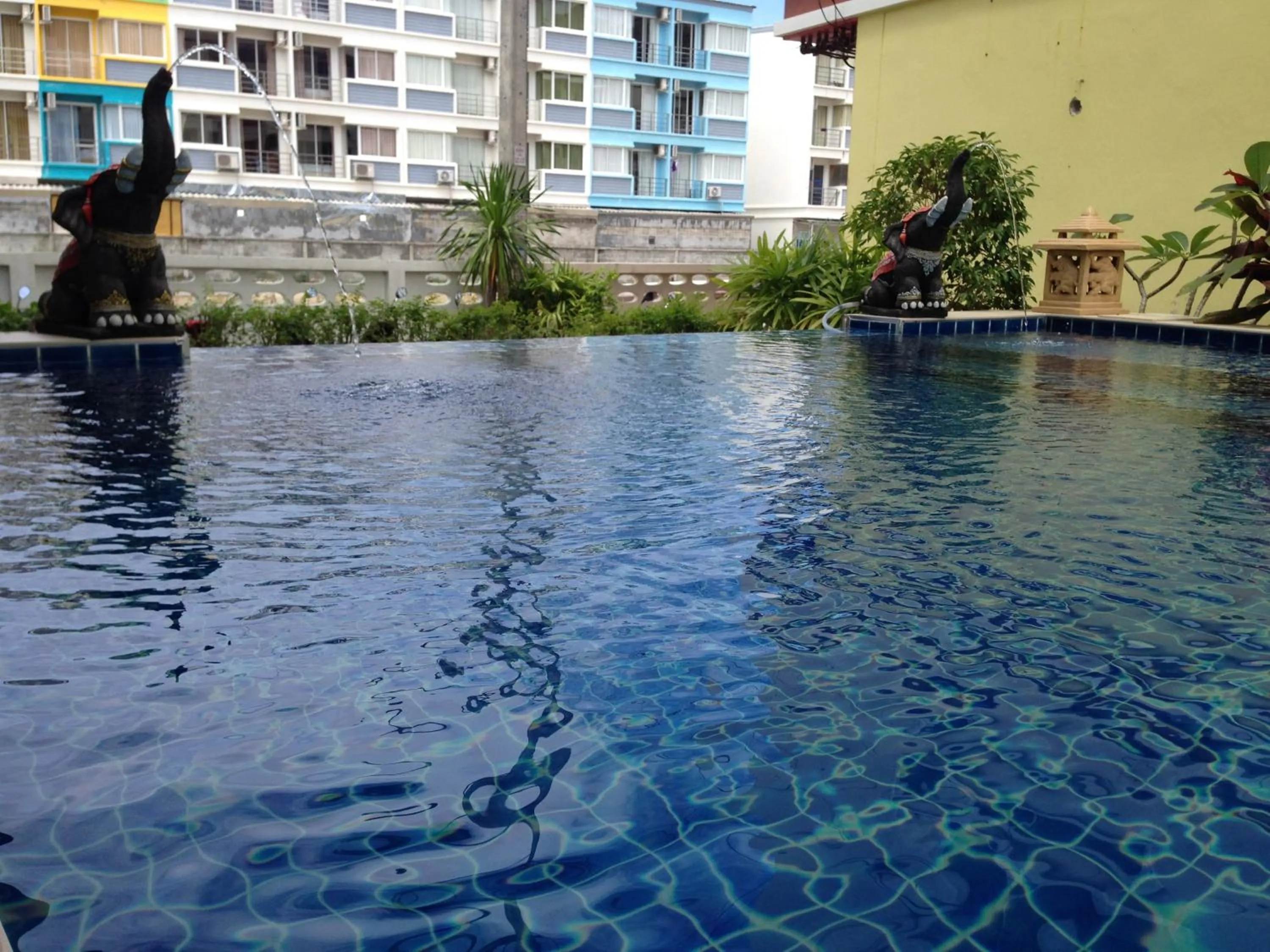 Swimming pool in Green Harbor Hotel & Service Apartment
