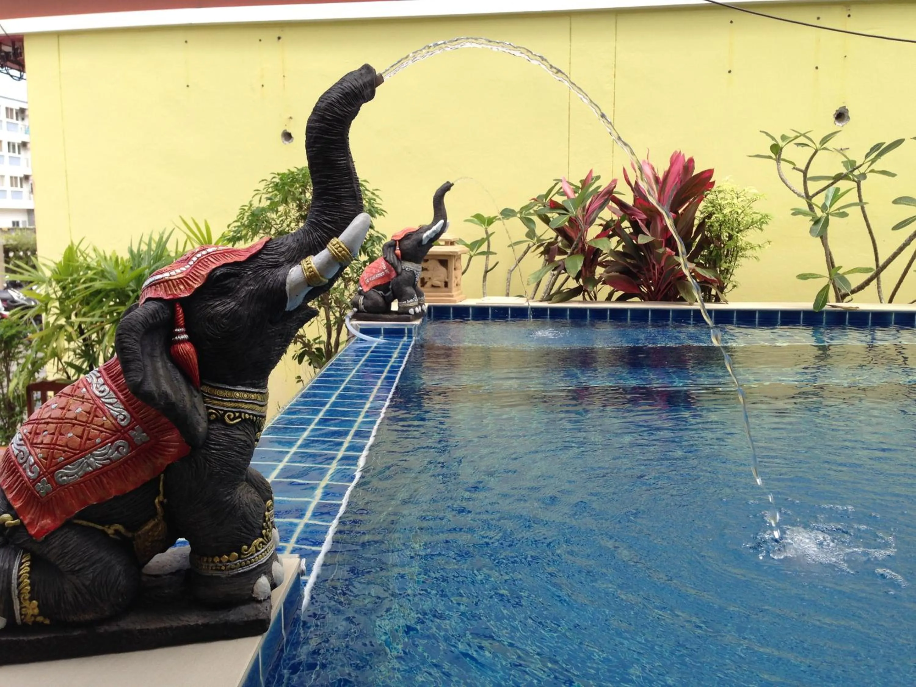 Swimming pool in Green Harbor Hotel & Service Apartment