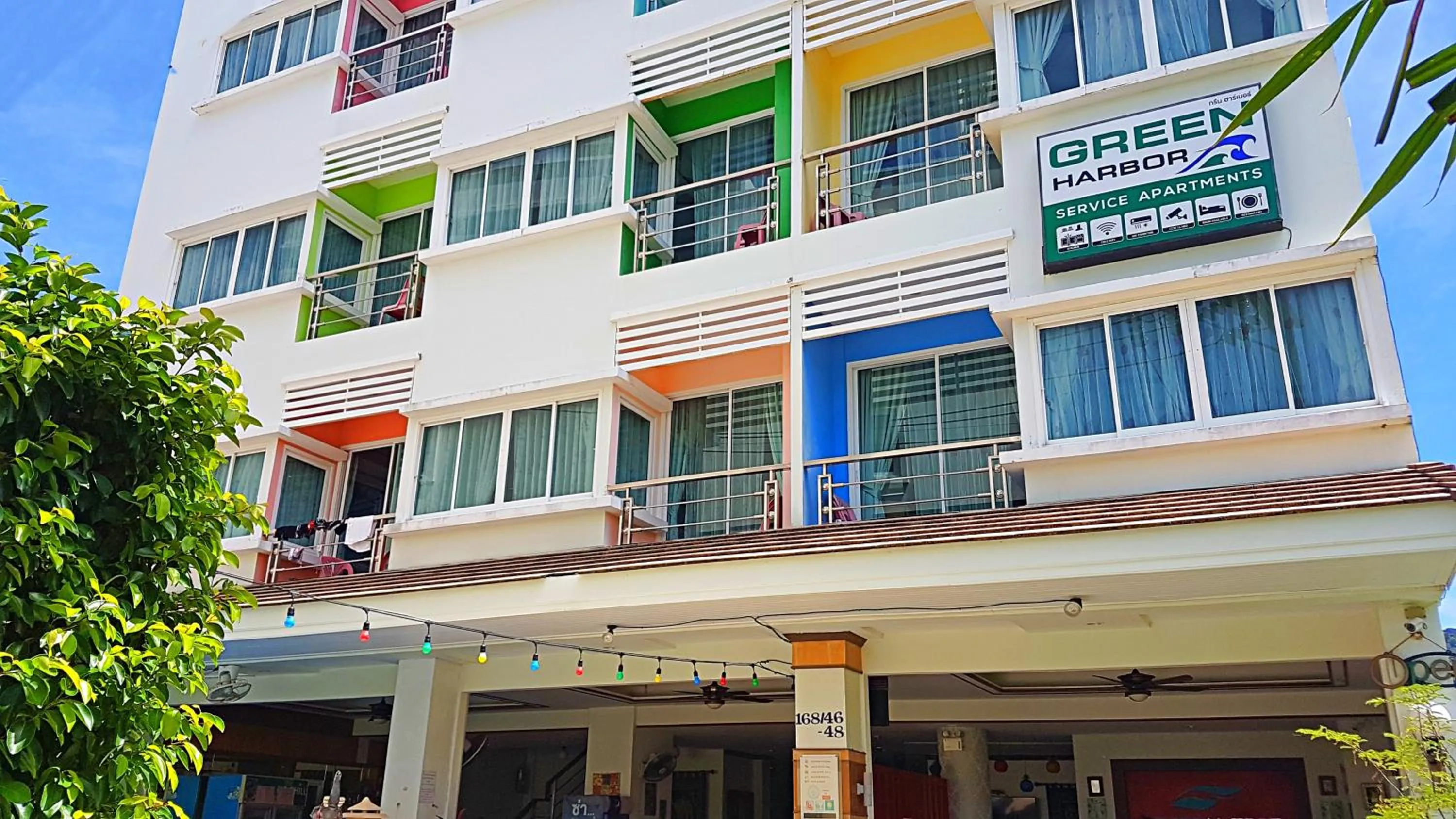 Property building in Green Harbor Hotel & Service Apartment