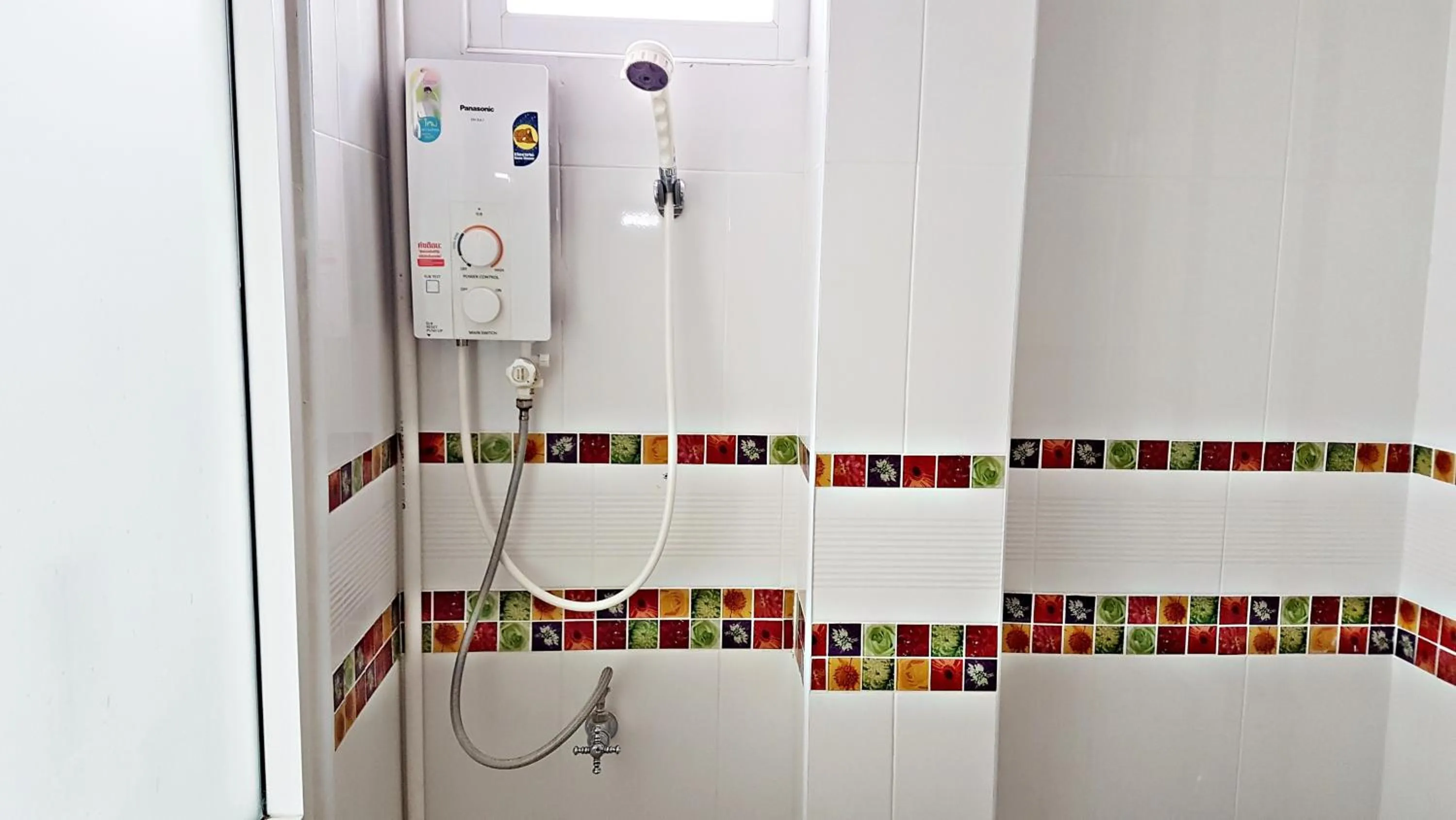 Shower in Green Harbor Hotel & Service Apartment