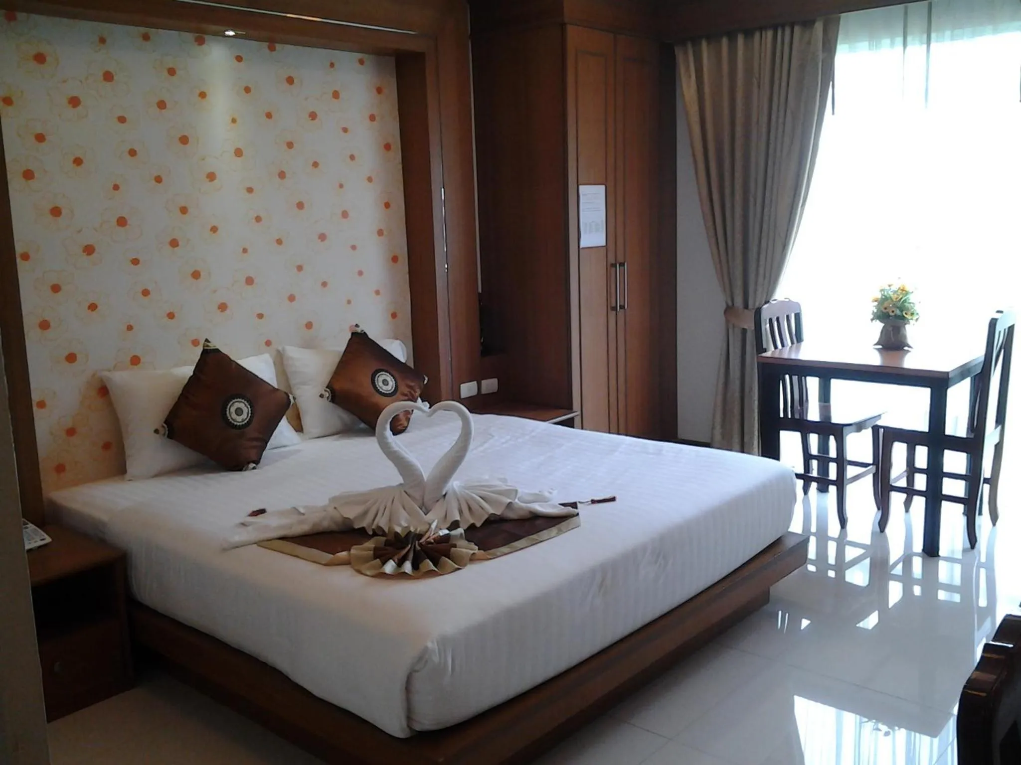 Bedroom, Bed in Green Harbor Hotel & Service Apartment