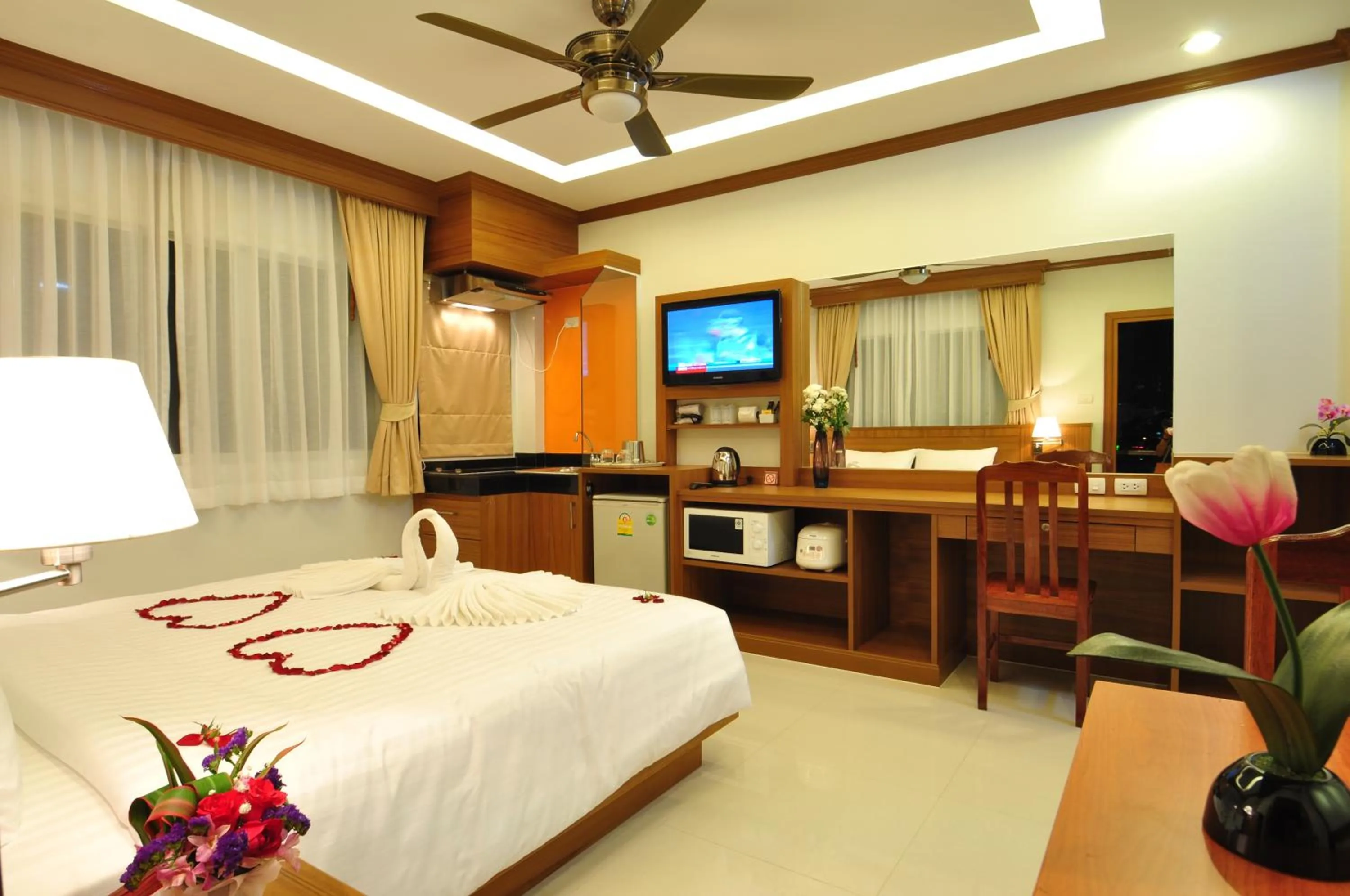 Bedroom, Bed in Green Harbor Hotel & Service Apartment