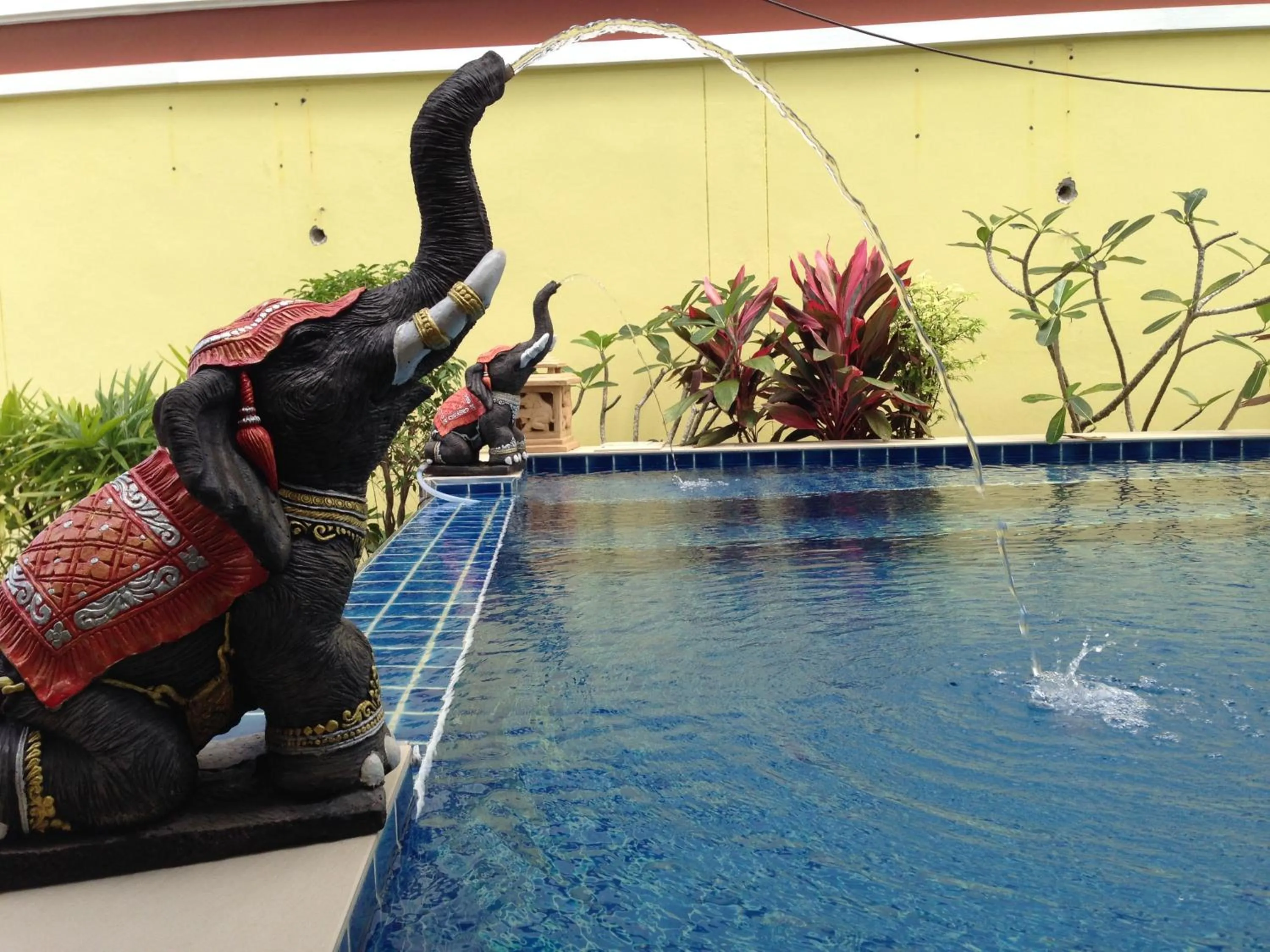 Swimming pool in Green Harbor Hotel & Service Apartment