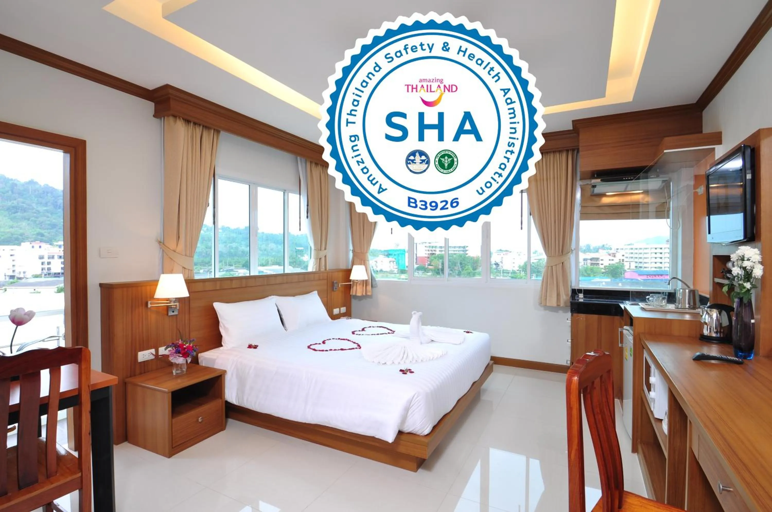 Photo of the whole room, Bed in Green Harbor Hotel & Service Apartment