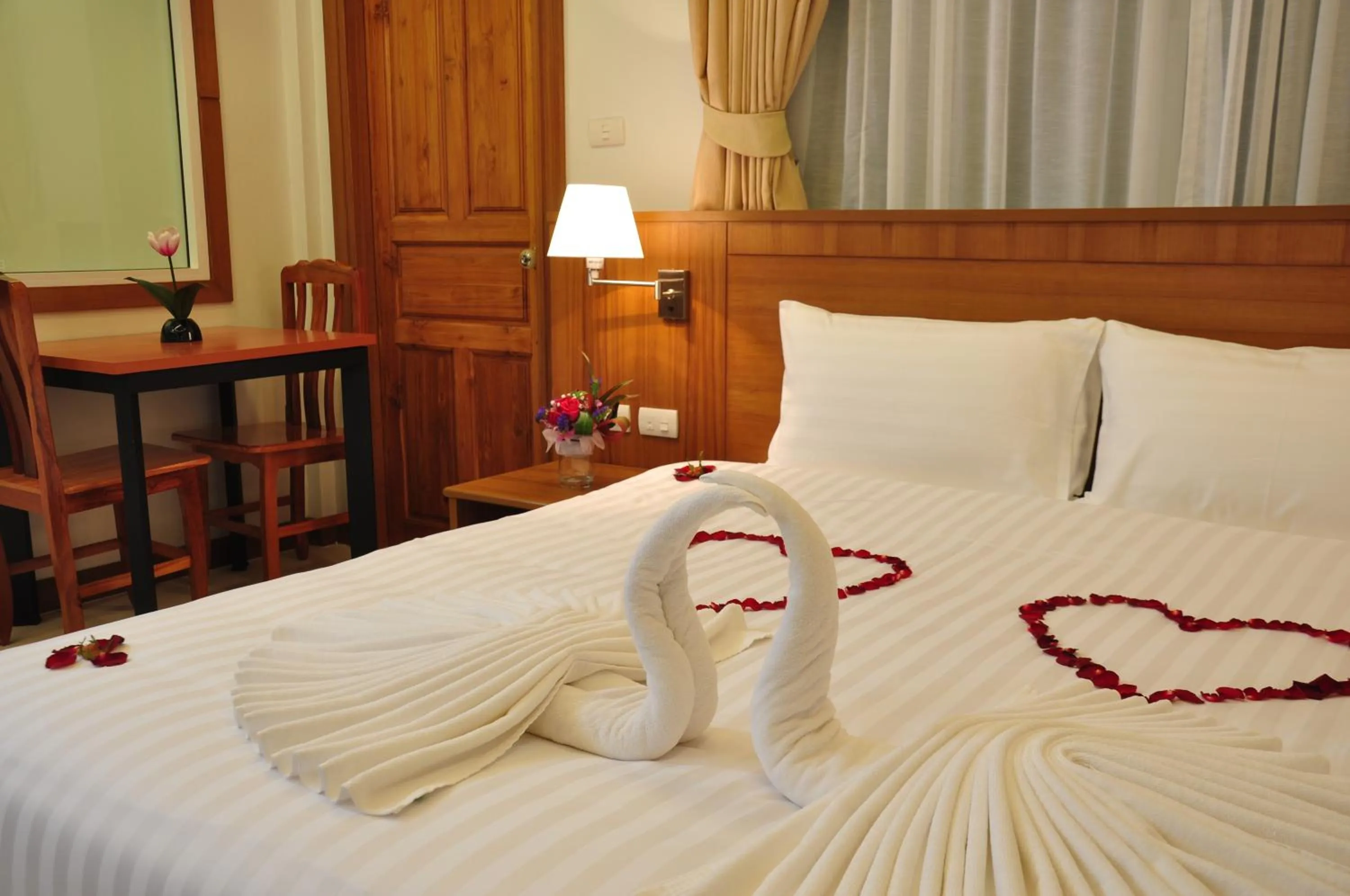 Bedroom, Bed in Green Harbor Hotel & Service Apartment