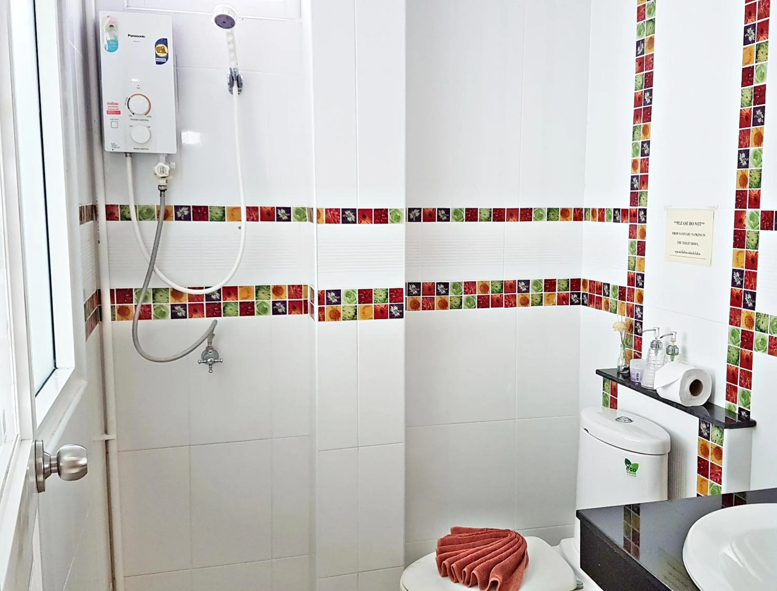 Shower in Green Harbor Hotel & Service Apartment