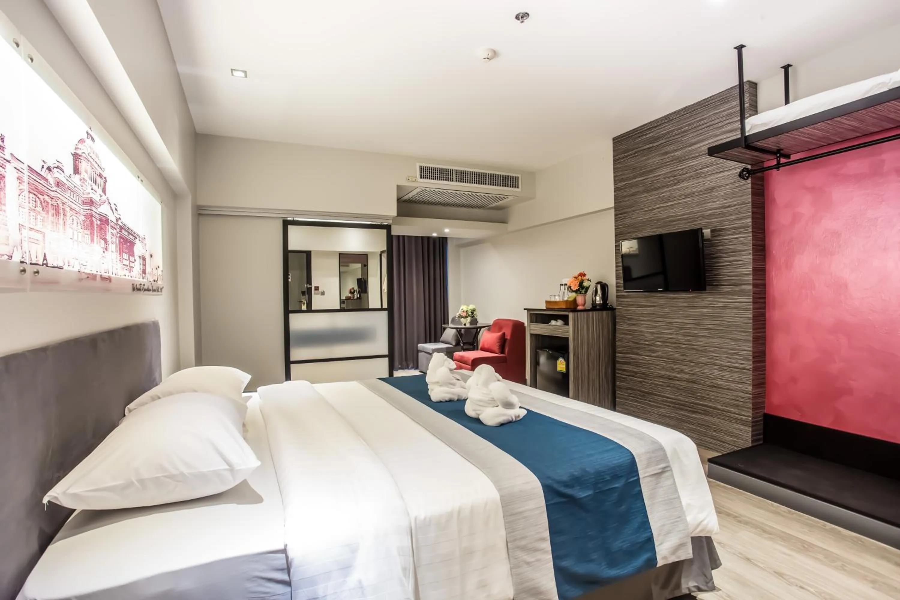 Photo of the whole room, Bed in Nouvo City Hotel