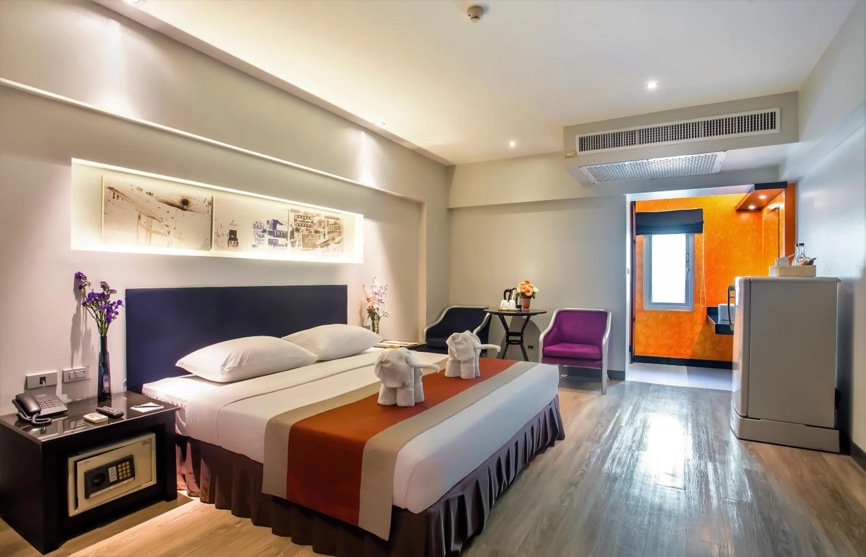 Photo of the whole room, Bed in Nouvo City Hotel