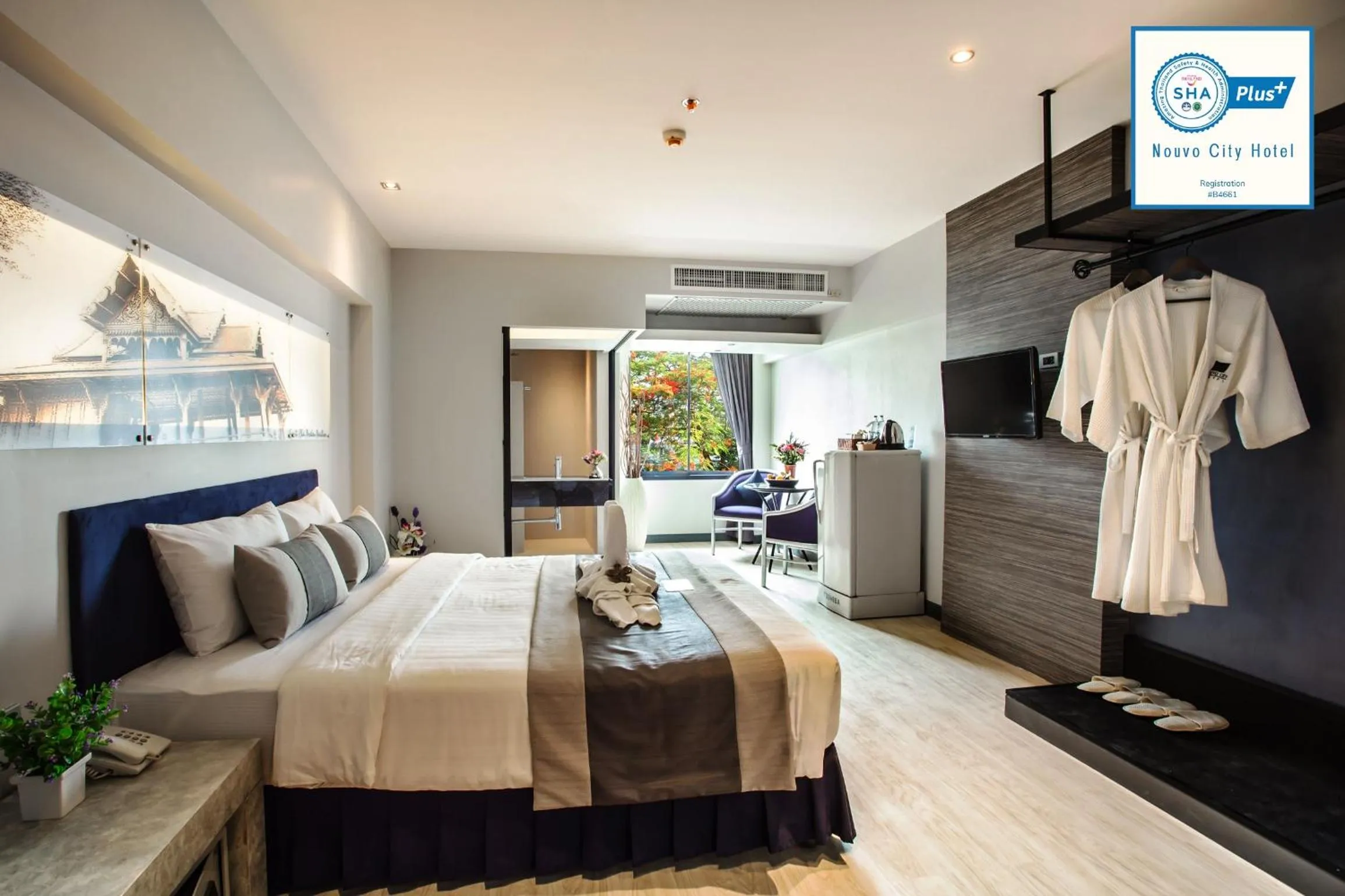 View (from property/room), Bed in Nouvo City Hotel