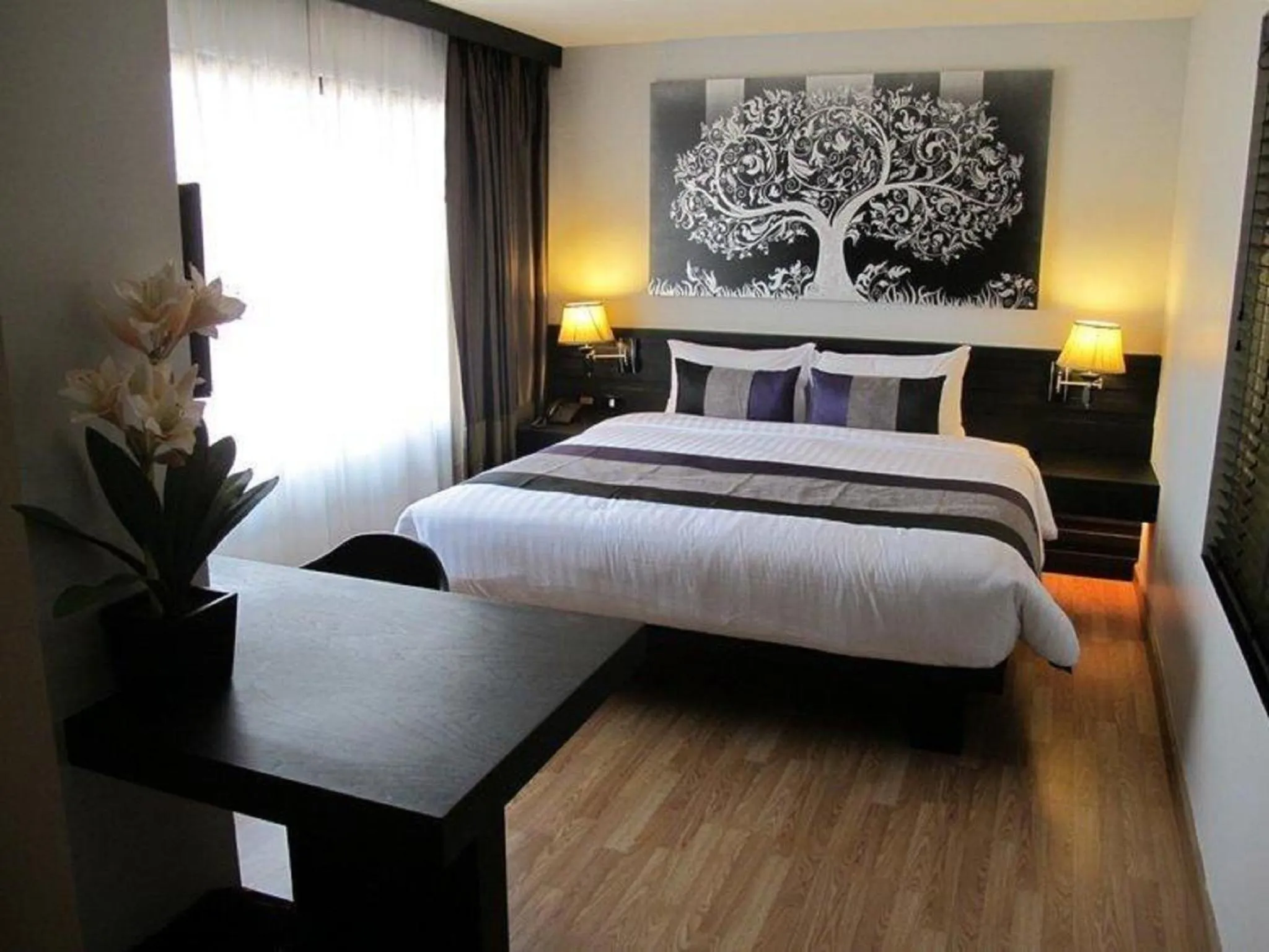 Bed in Nouvo City Hotel