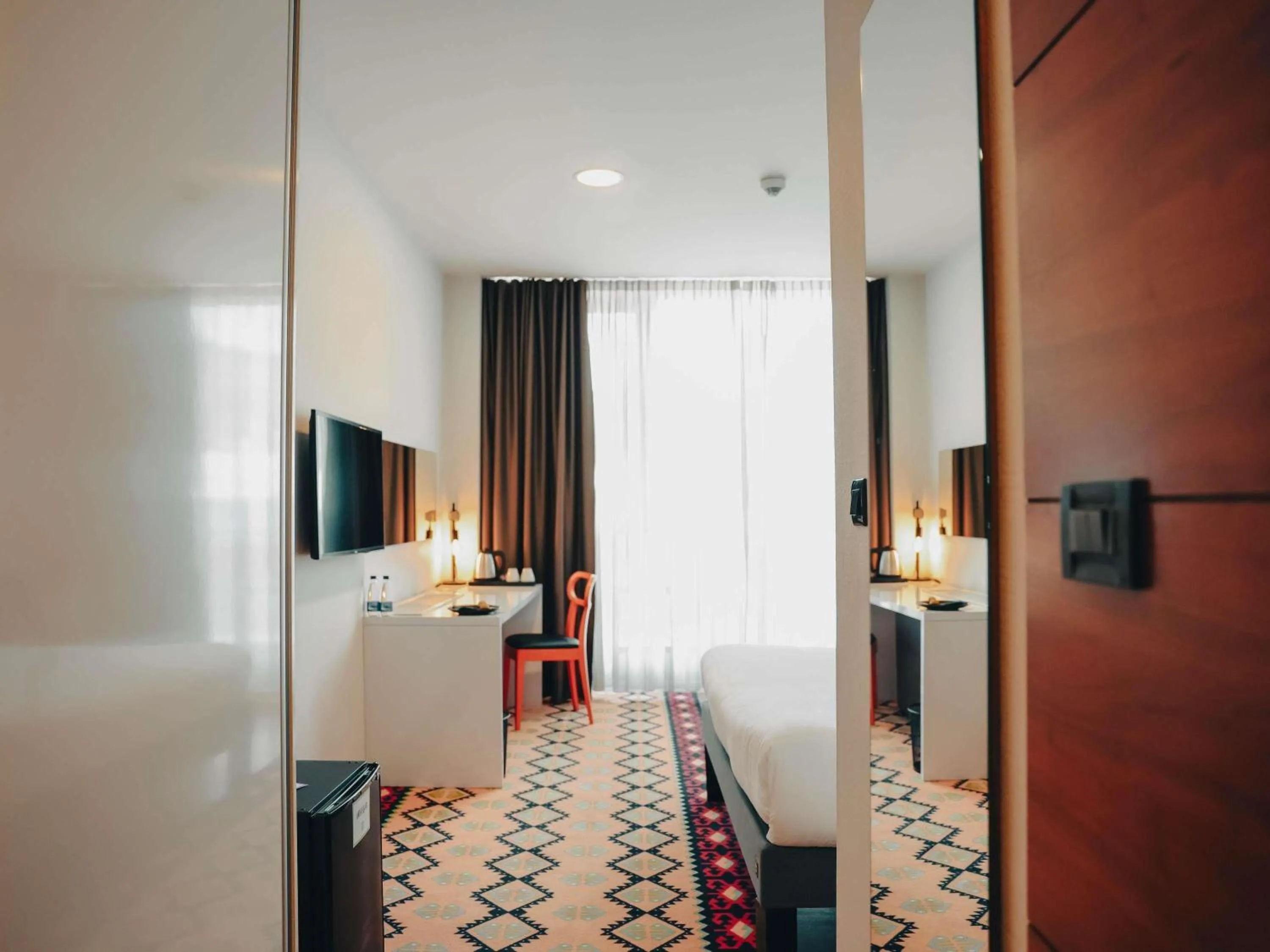 Bedroom in ibis Styles Sarajevo