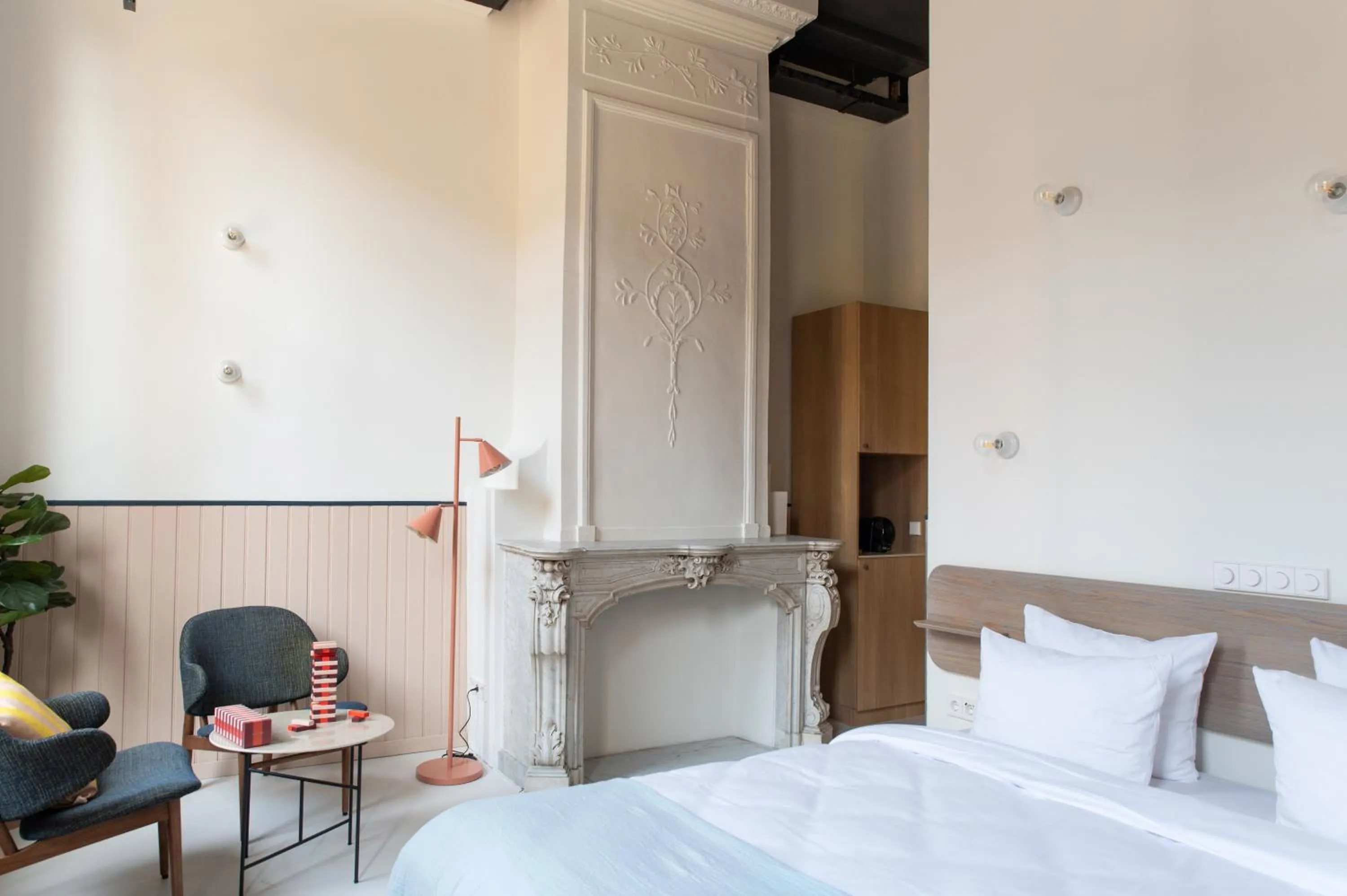 Bed in Anne&Max Boutique Hotel