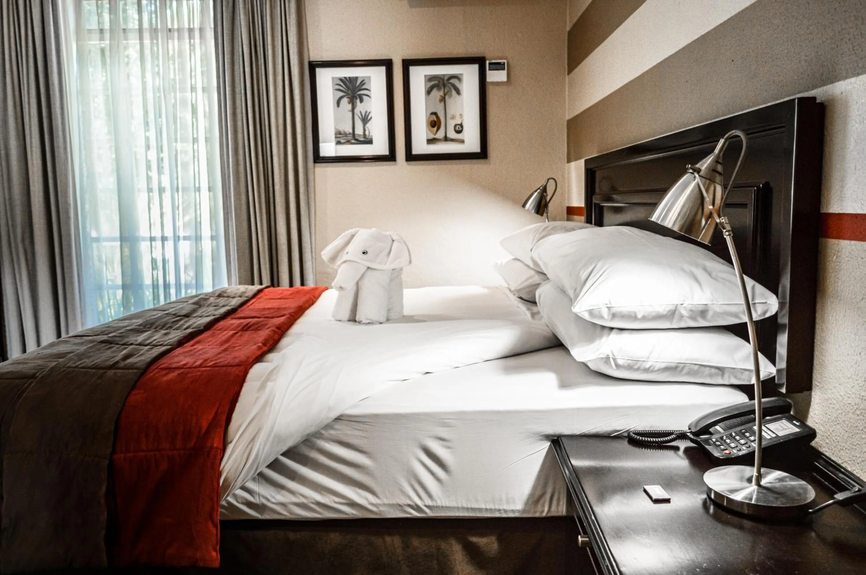 Bed in Indaba Hotel, Spa & Conference Center