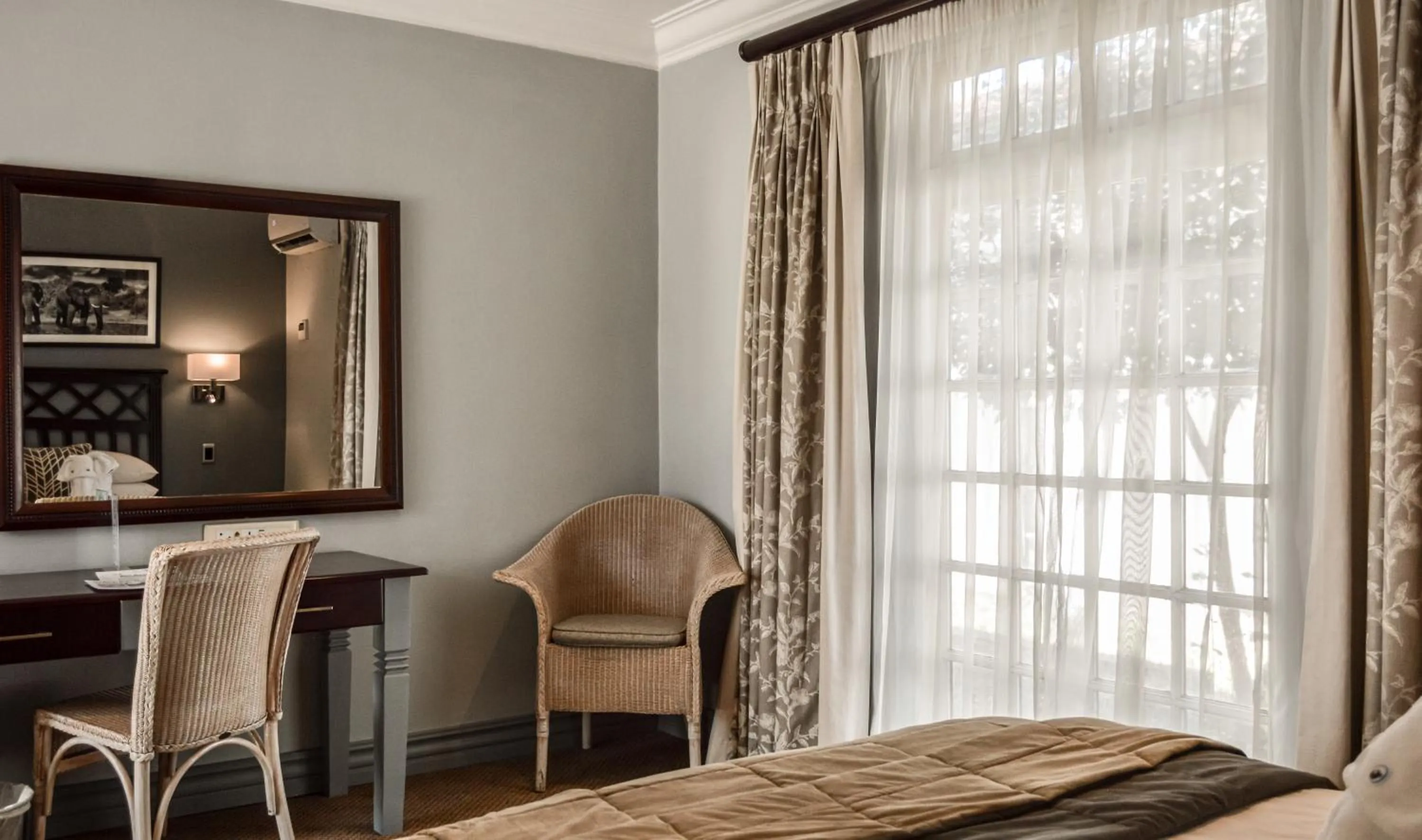 Living room, Bed in Indaba Hotel, Spa & Conference Center