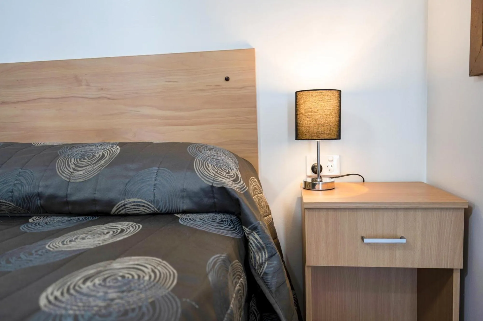 Bed in Palm Valley Motel