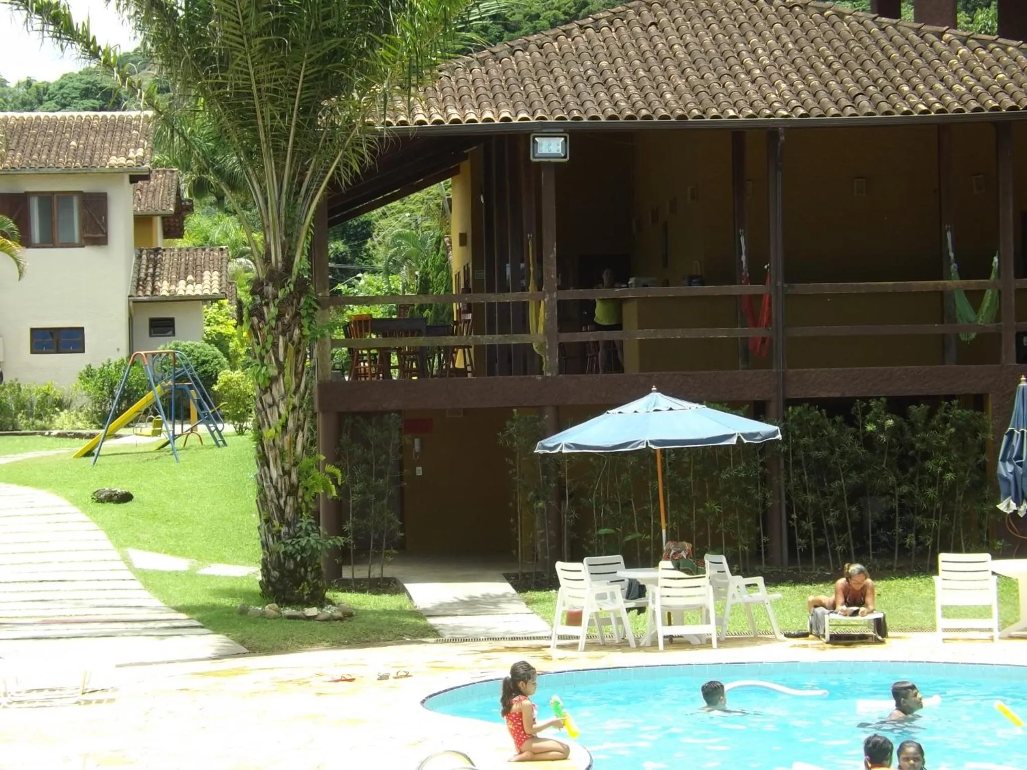 Swimming pool in Chalé Praia Boiçucanga wi fi piscina Village Mirante Litoral Norte SP