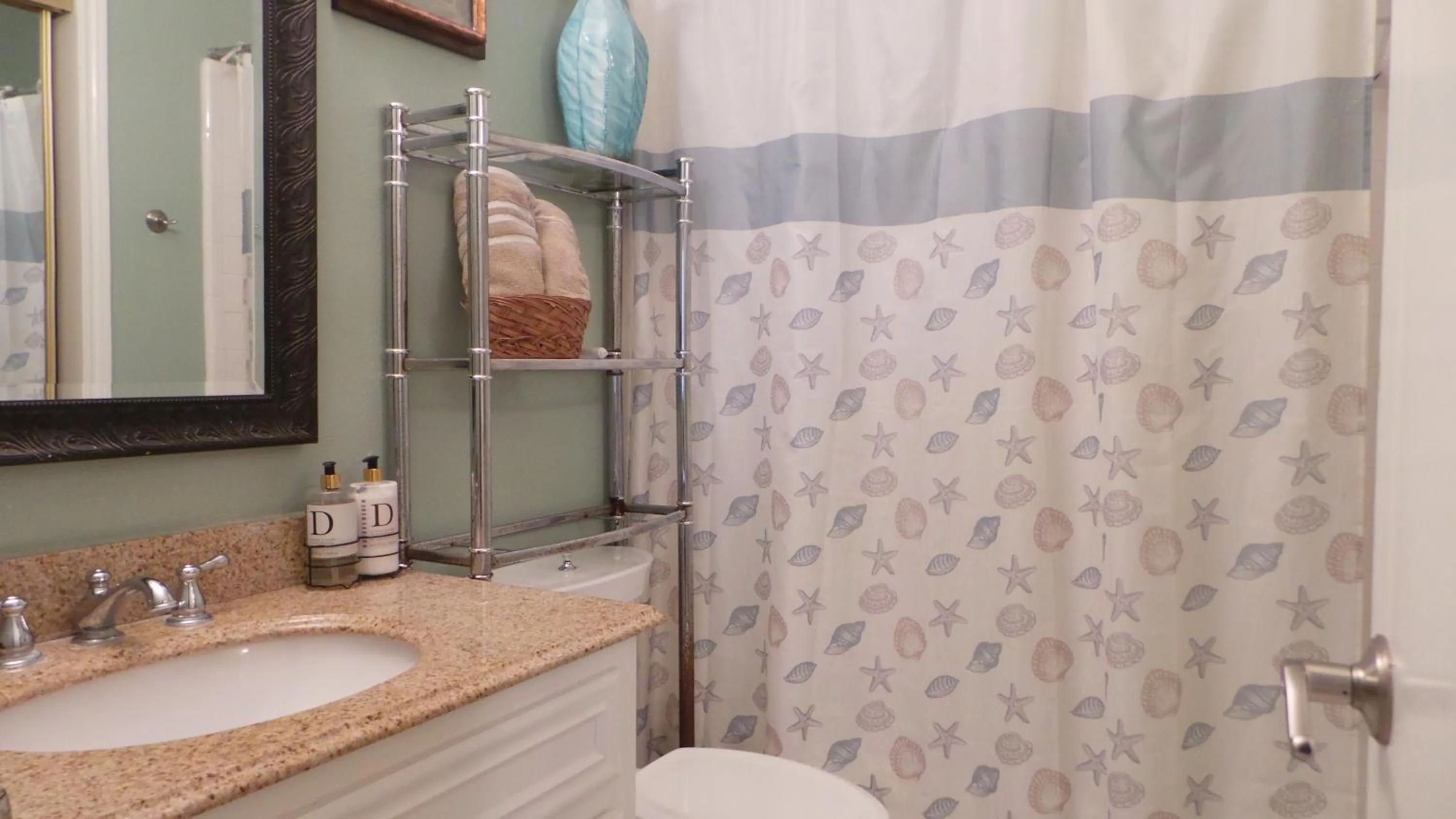 Bathroom in The Dunes Condominiums by Cheap Getaway