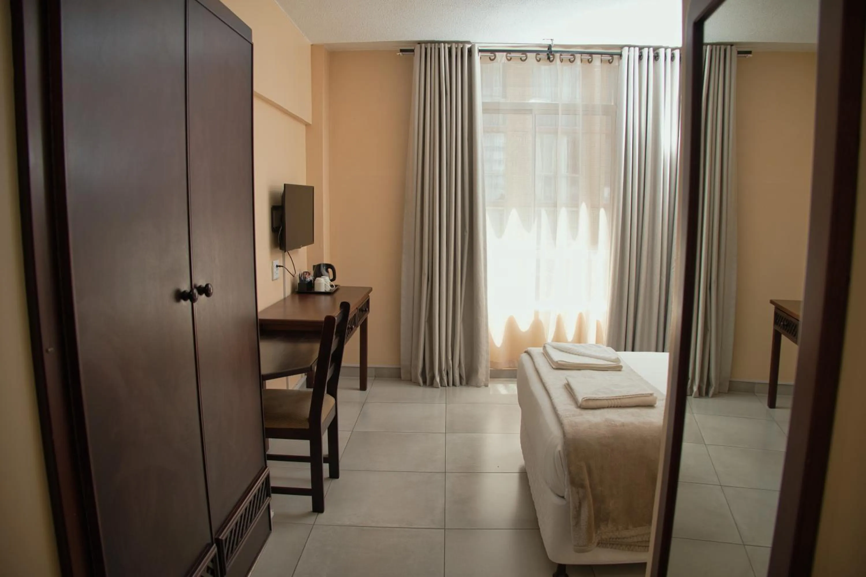 Photo of the whole room, Bed in Gooderson Tropicana Hotel