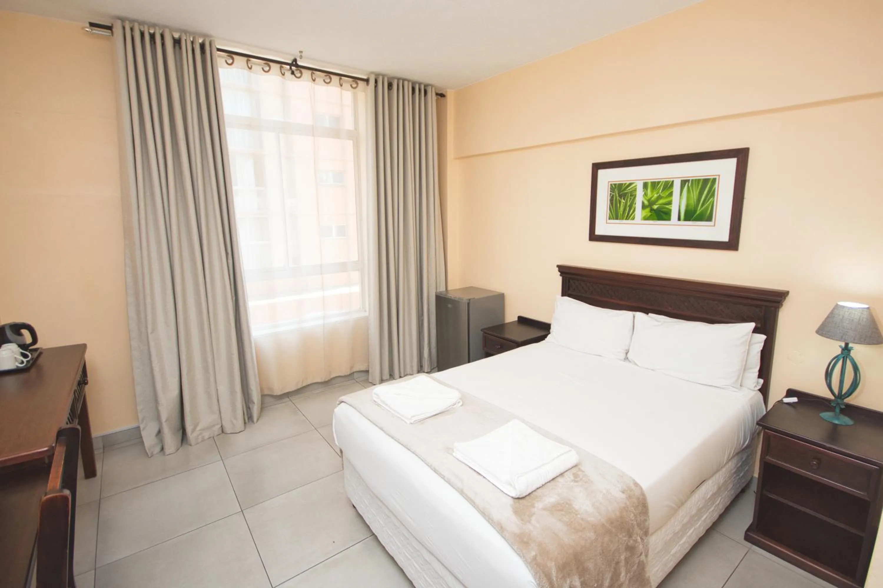 Bed in Gooderson Tropicana Hotel