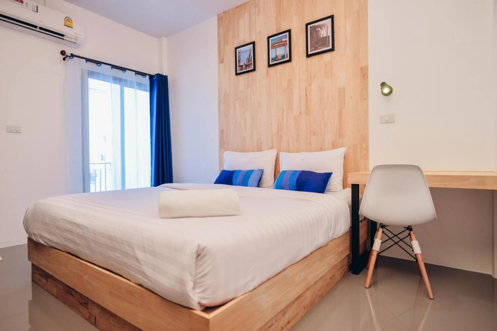 Bed in The Cozy Hotel