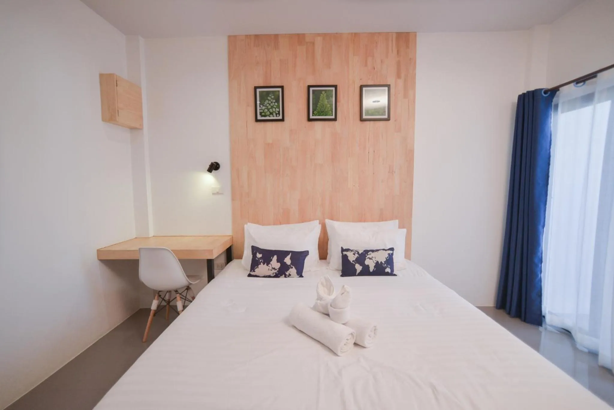 Bed in The Cozy Hotel