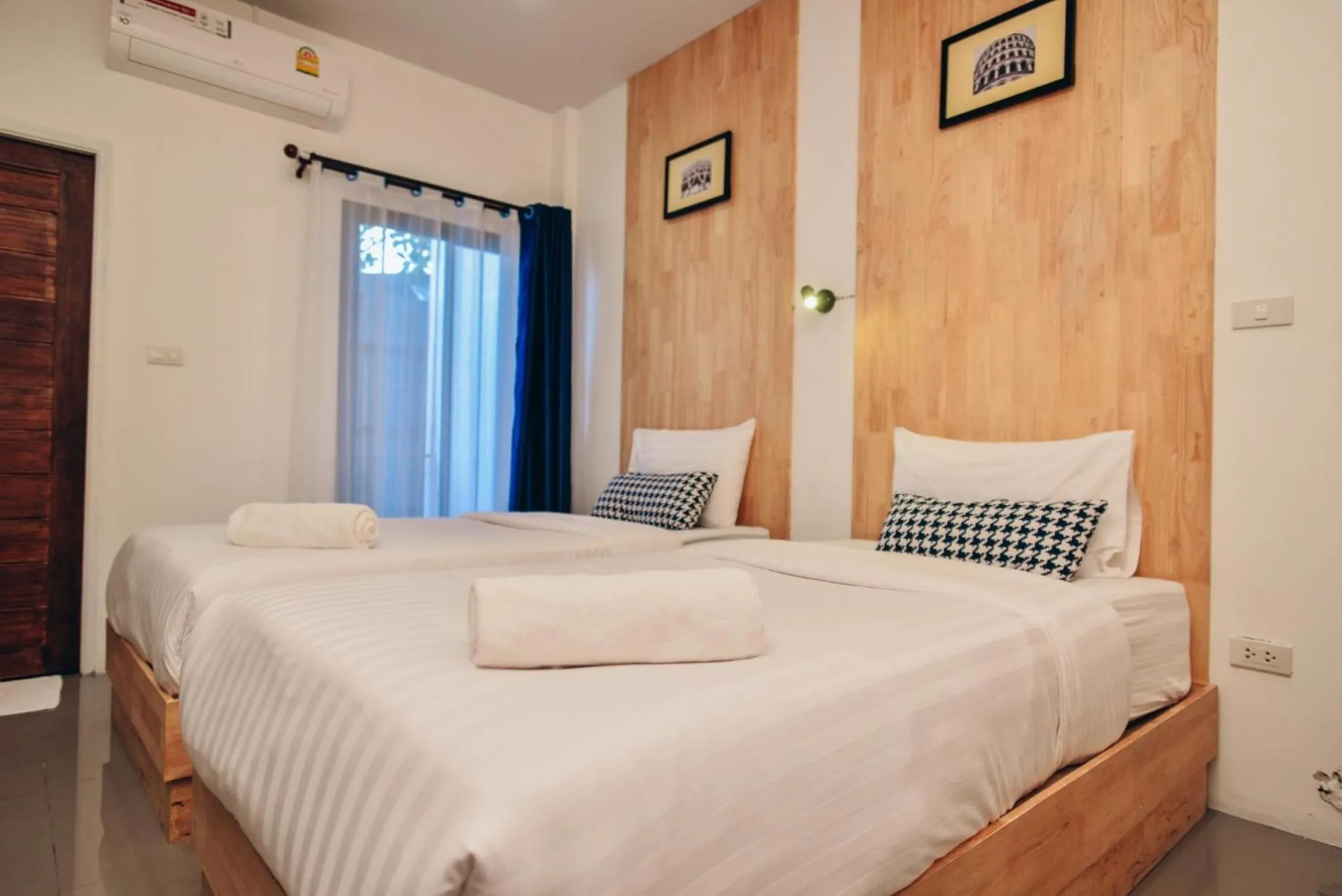 Bed in The Cozy Hotel