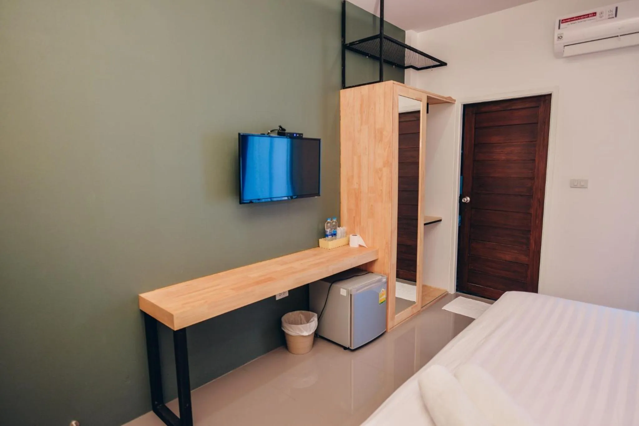 Bed in The Cozy Hotel