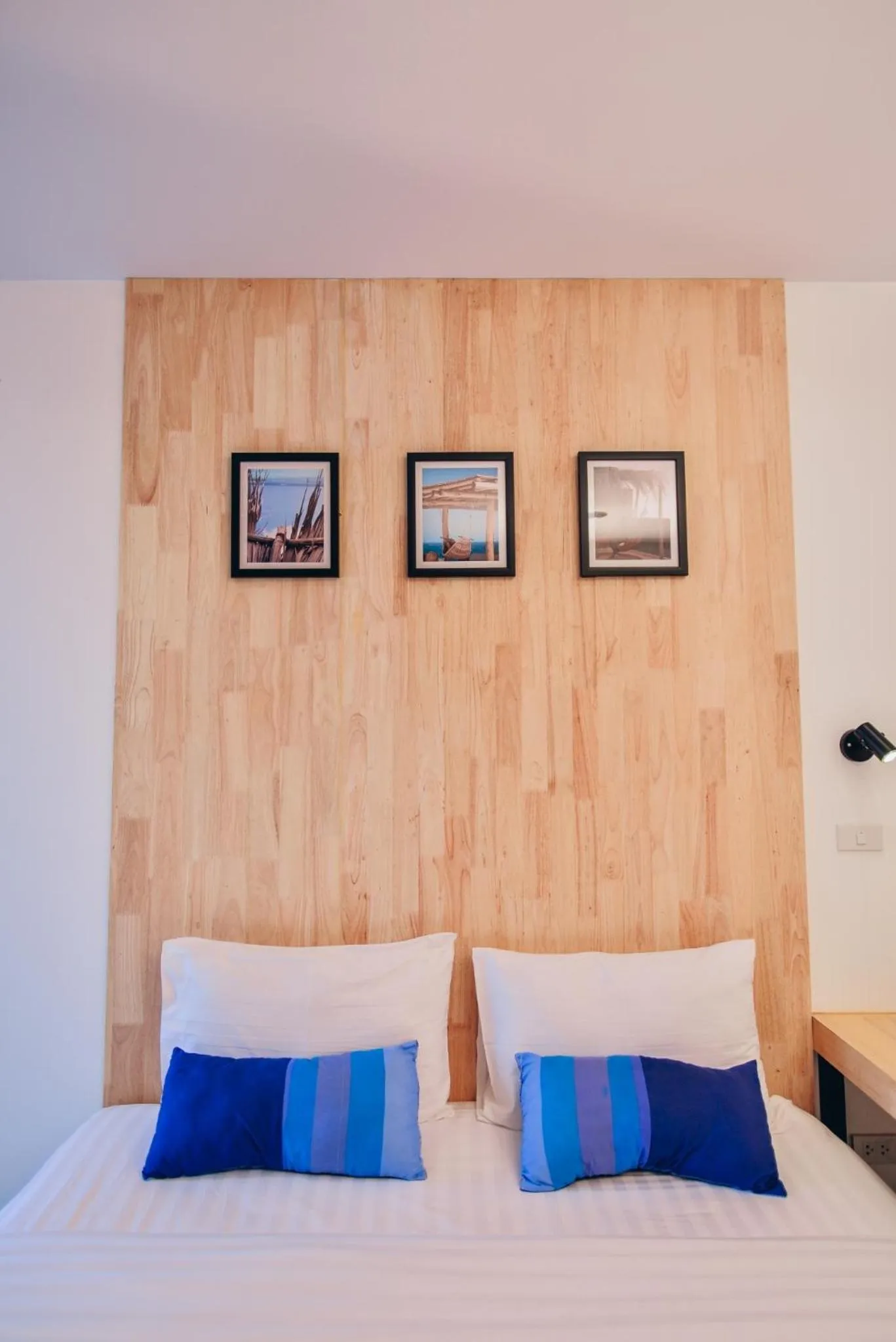 Bed in The Cozy Hotel