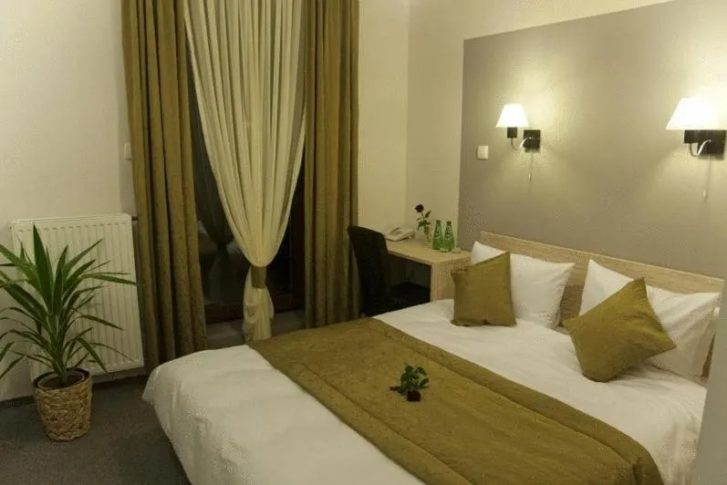 Bed in Hotel Vis A Vis