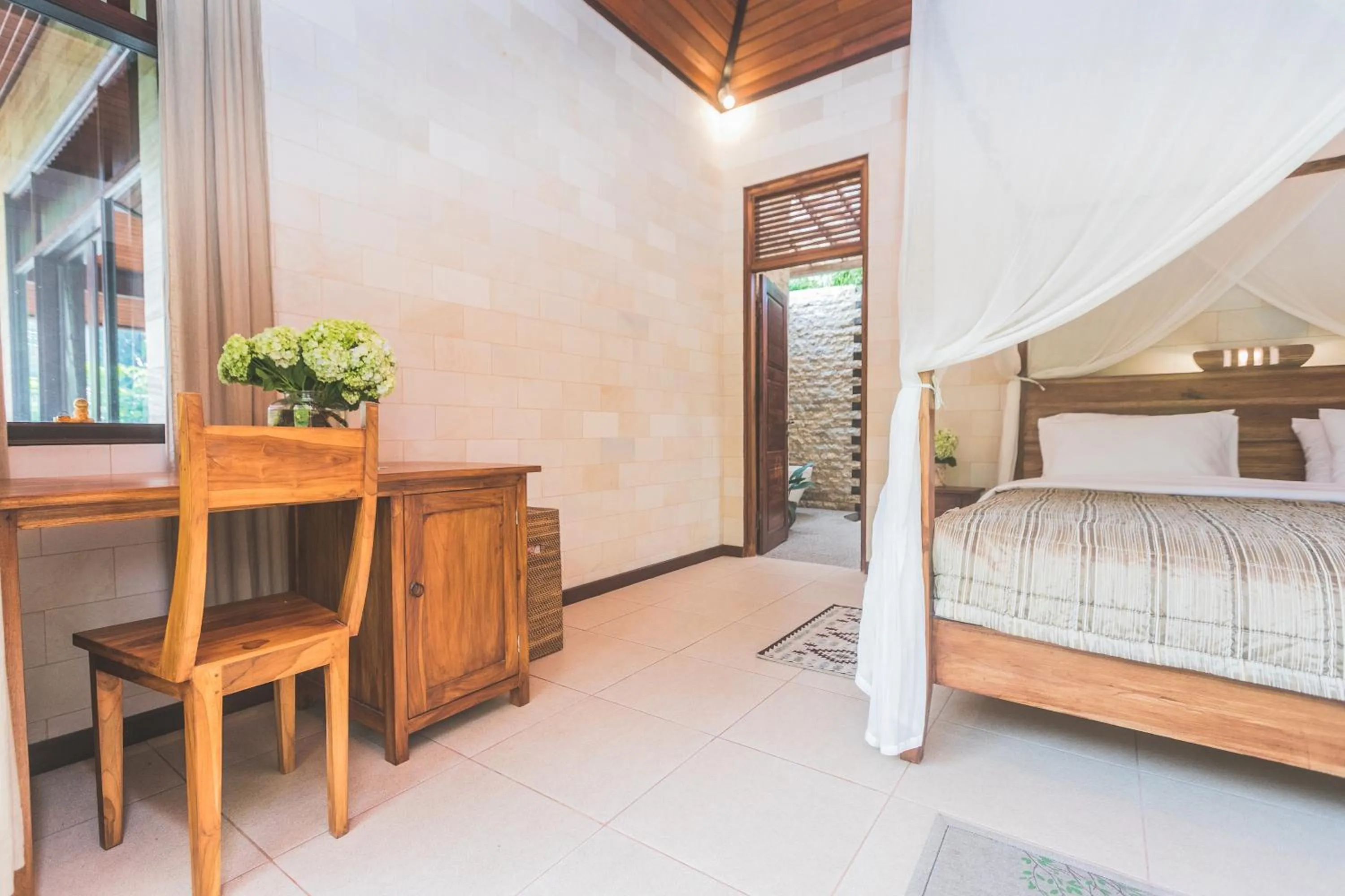 Bed in A Priori Villa Ubud
