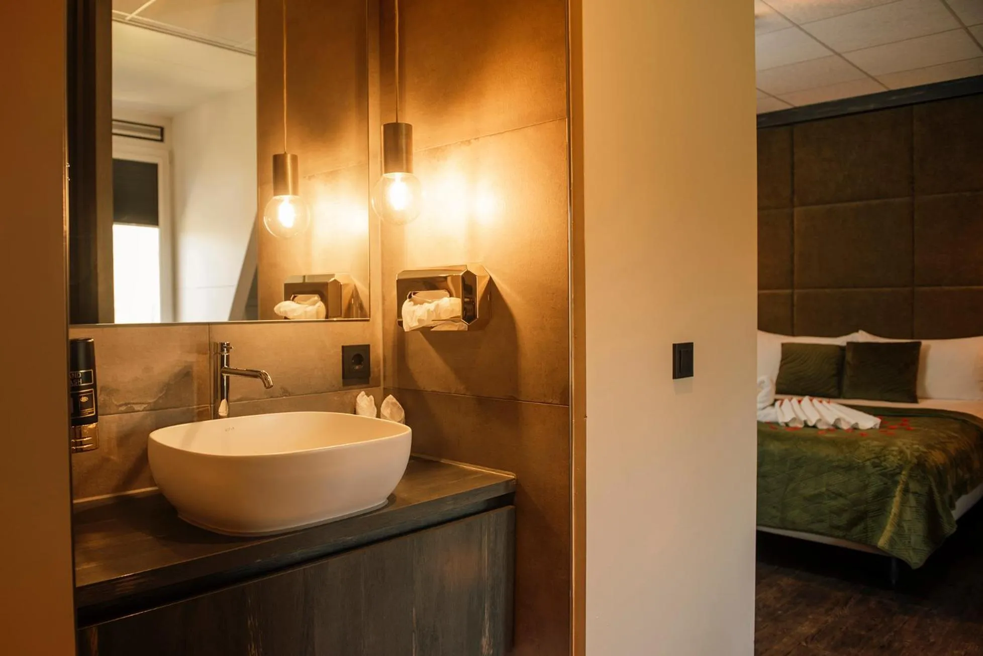 Bed in Hotel de Kastanjefabriek