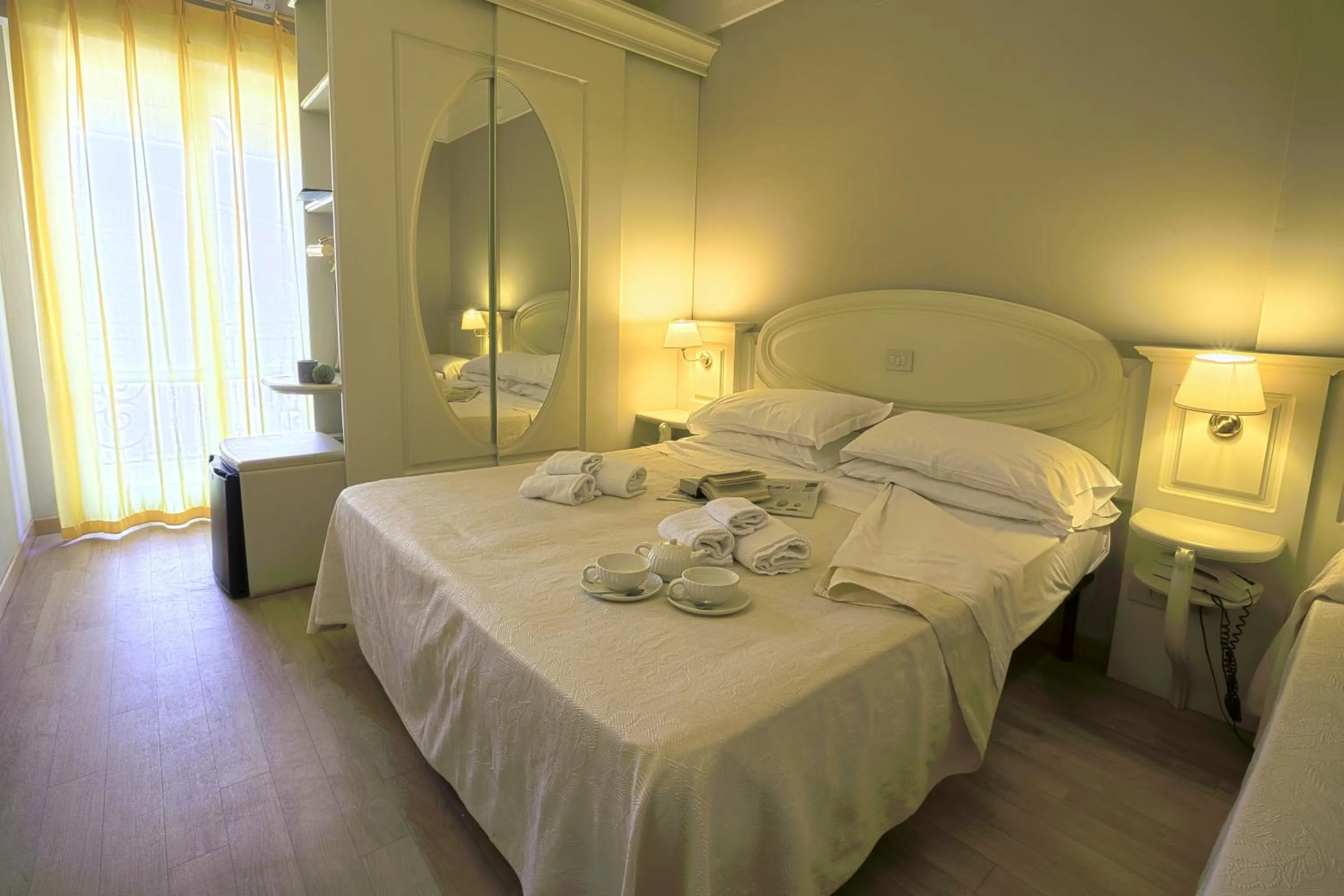Bed in Hotel Mocambo piscina, spiaggia e biciclette