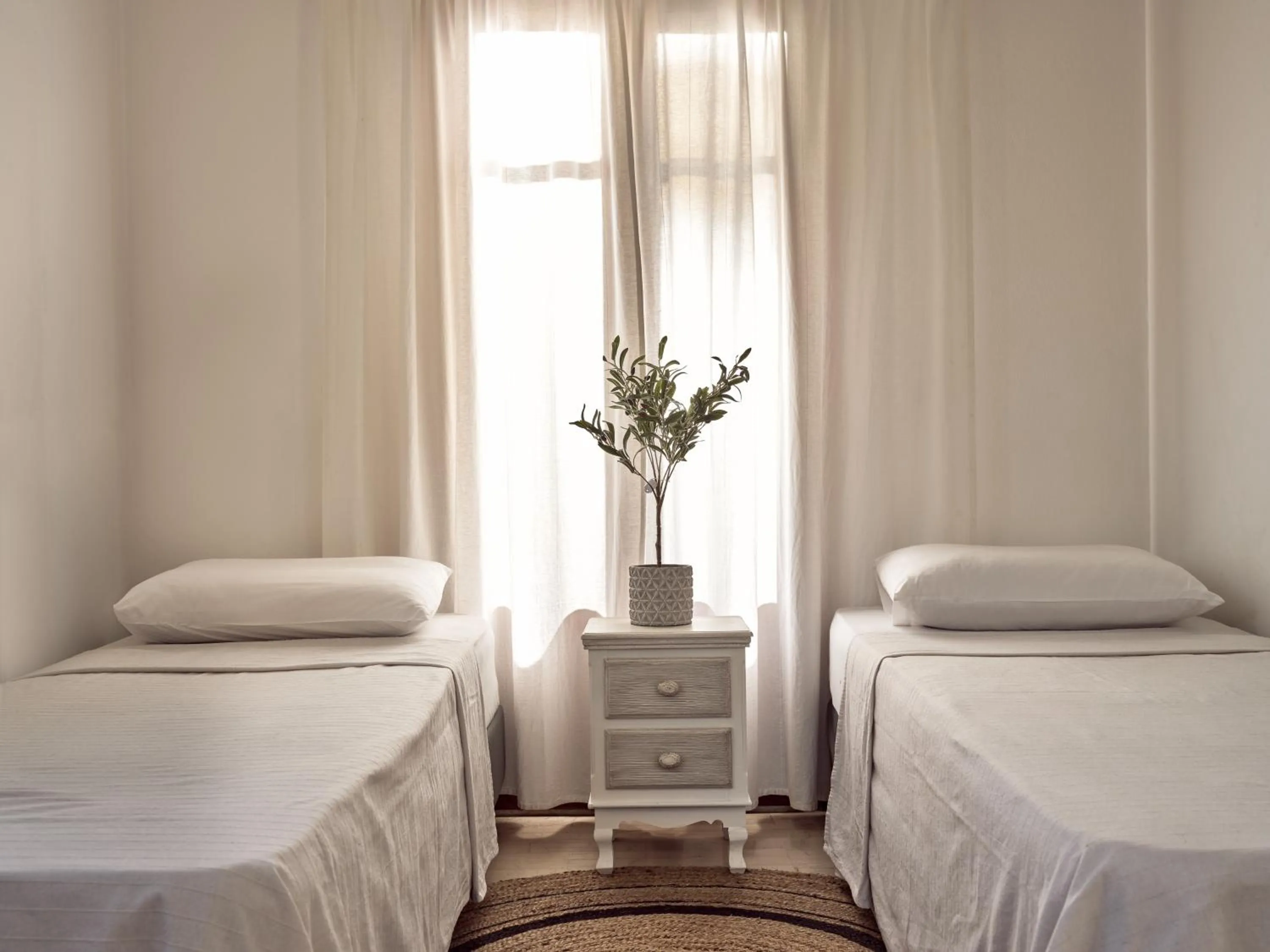 Bed in Razis Apartments