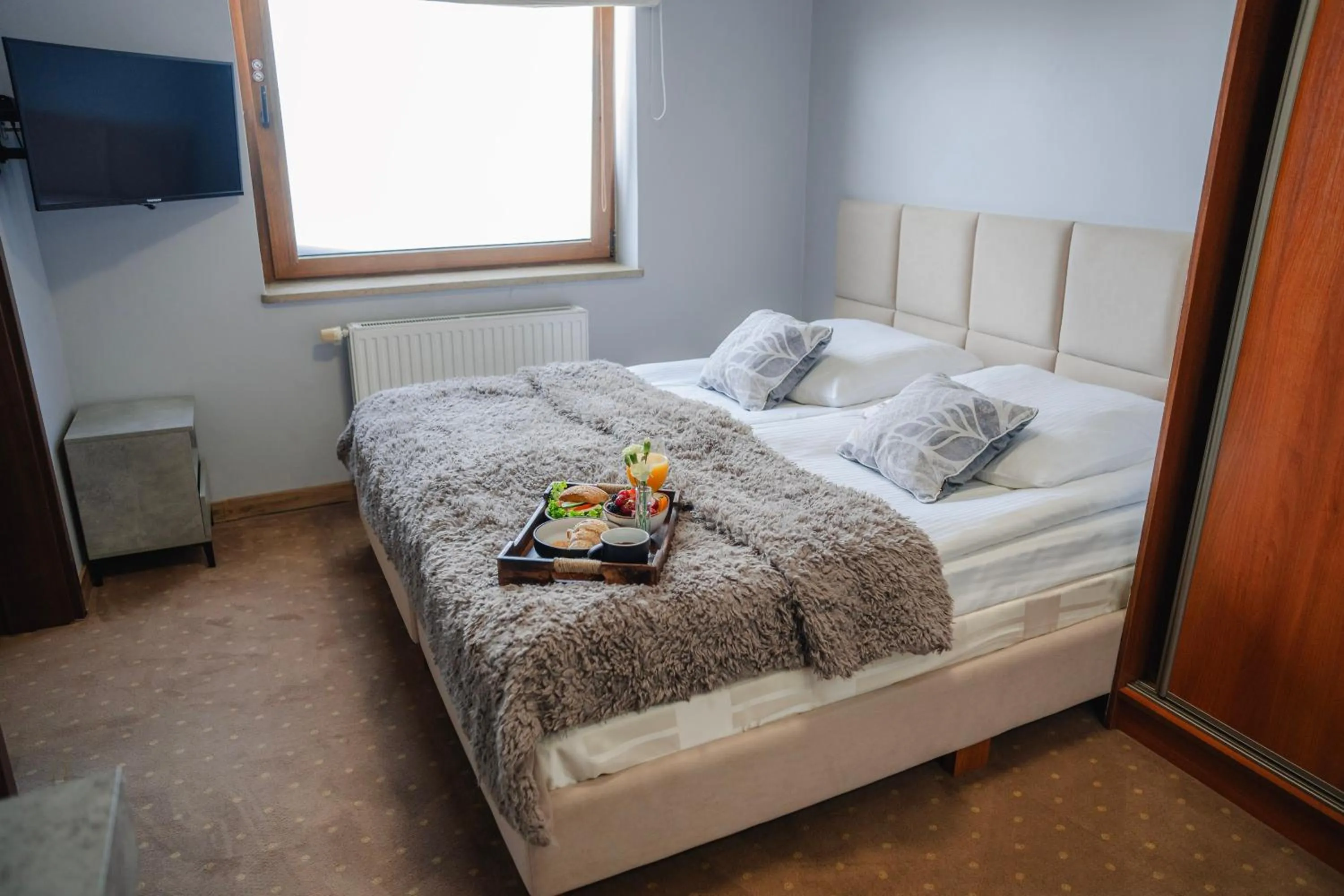 Bed in Hotel Kosmowski