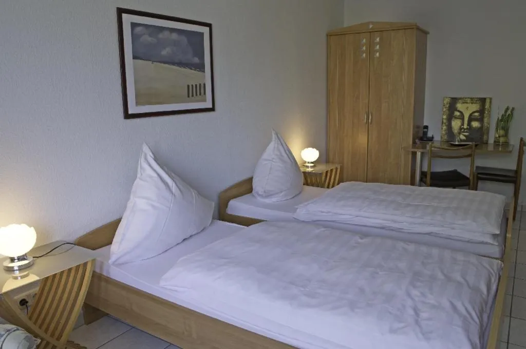 Bed in Hotel Hilgers