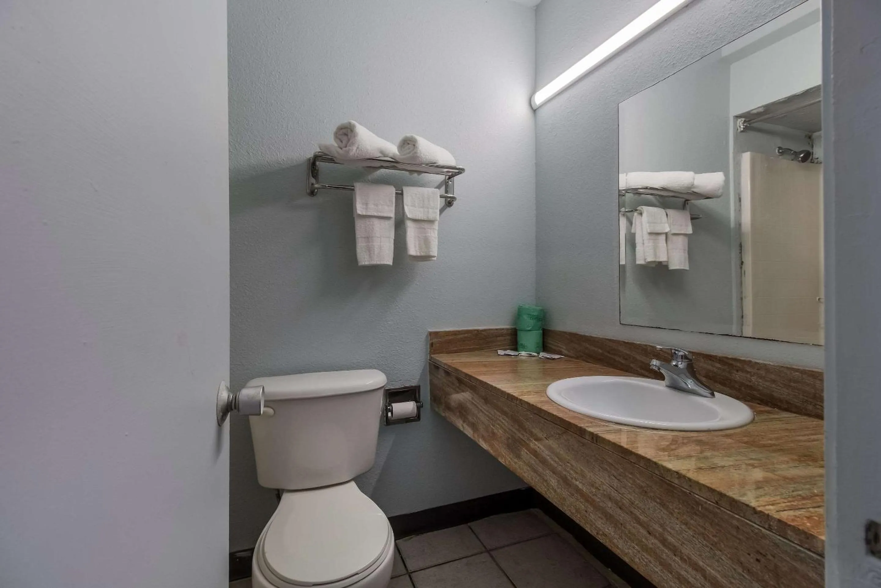 Bedroom in Rodeway Inn Conference Center