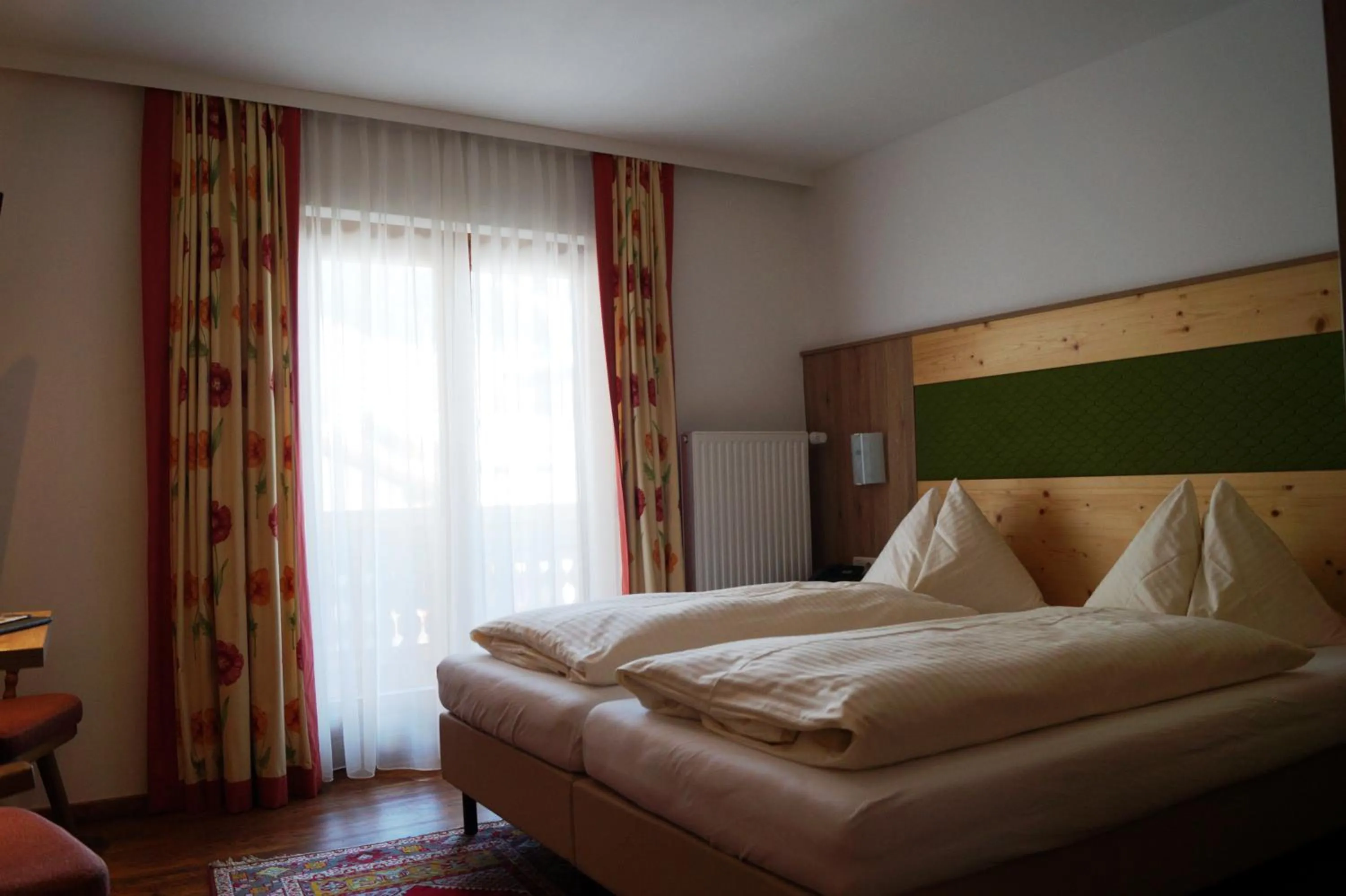 Photo of the whole room, Bed in Hotel Wechselberger by Alpeffect Hotels