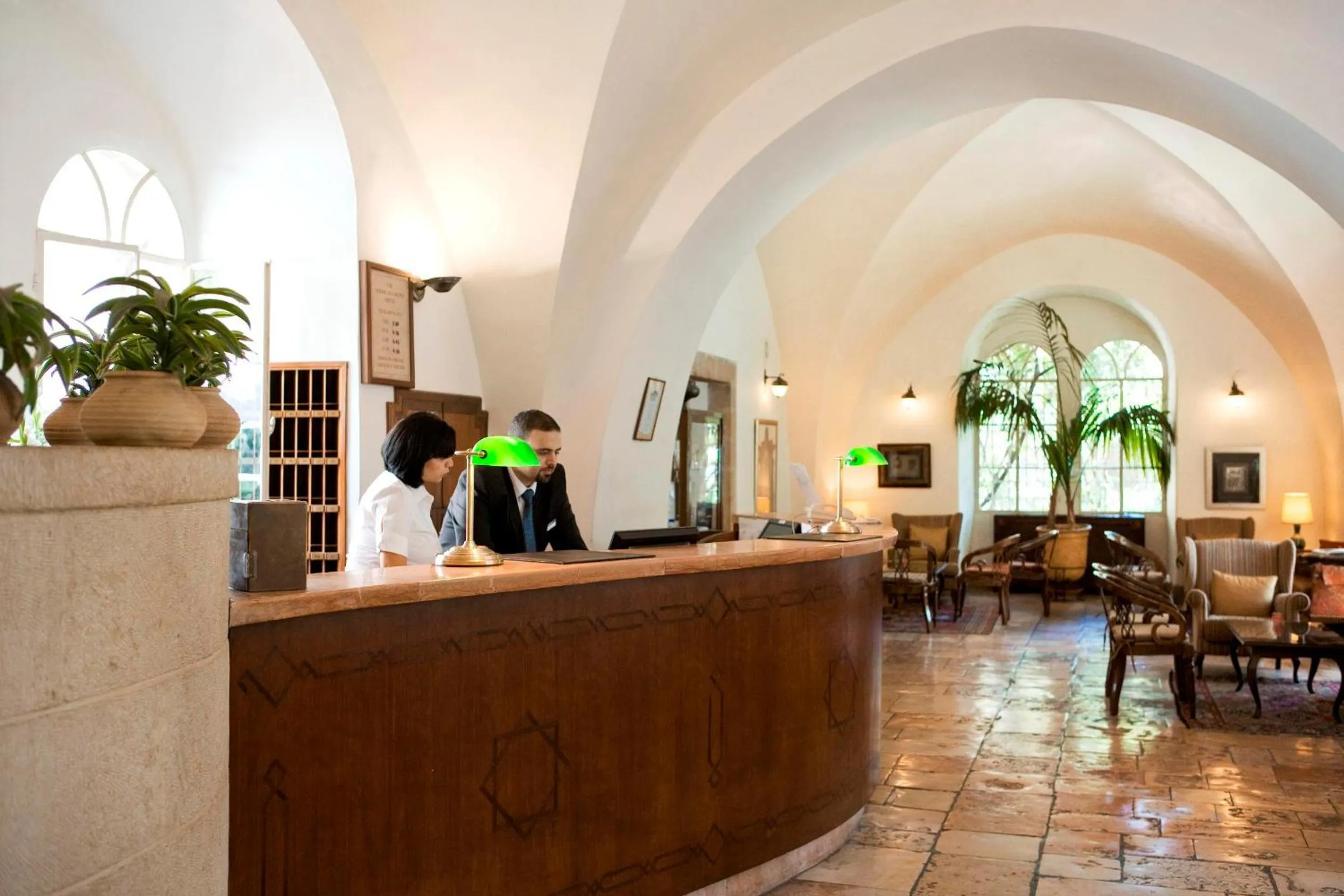 People in The American Colony Hotel - Small Luxury Hotels of the World