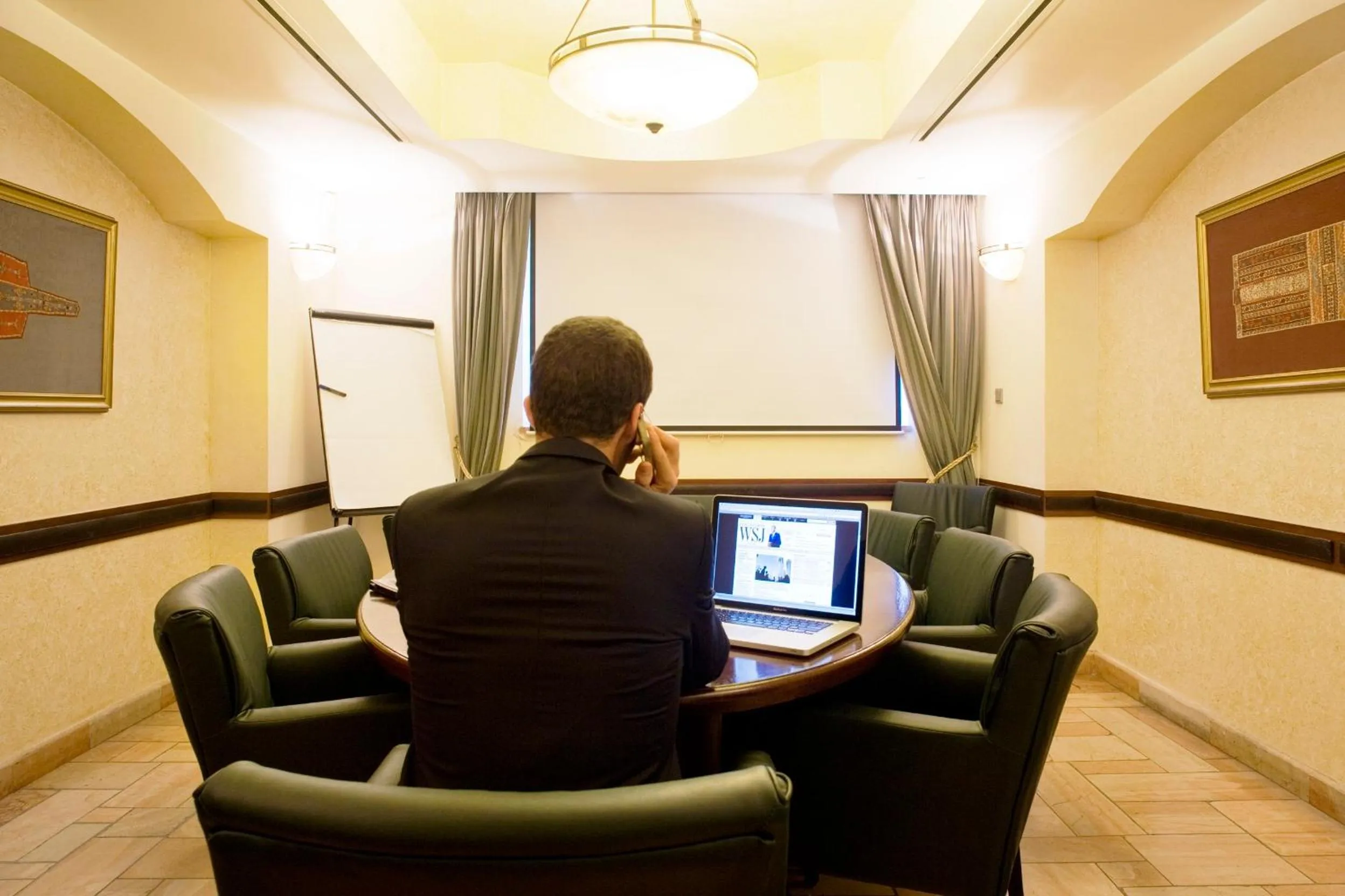 People in The American Colony Hotel - Small Luxury Hotels of the World