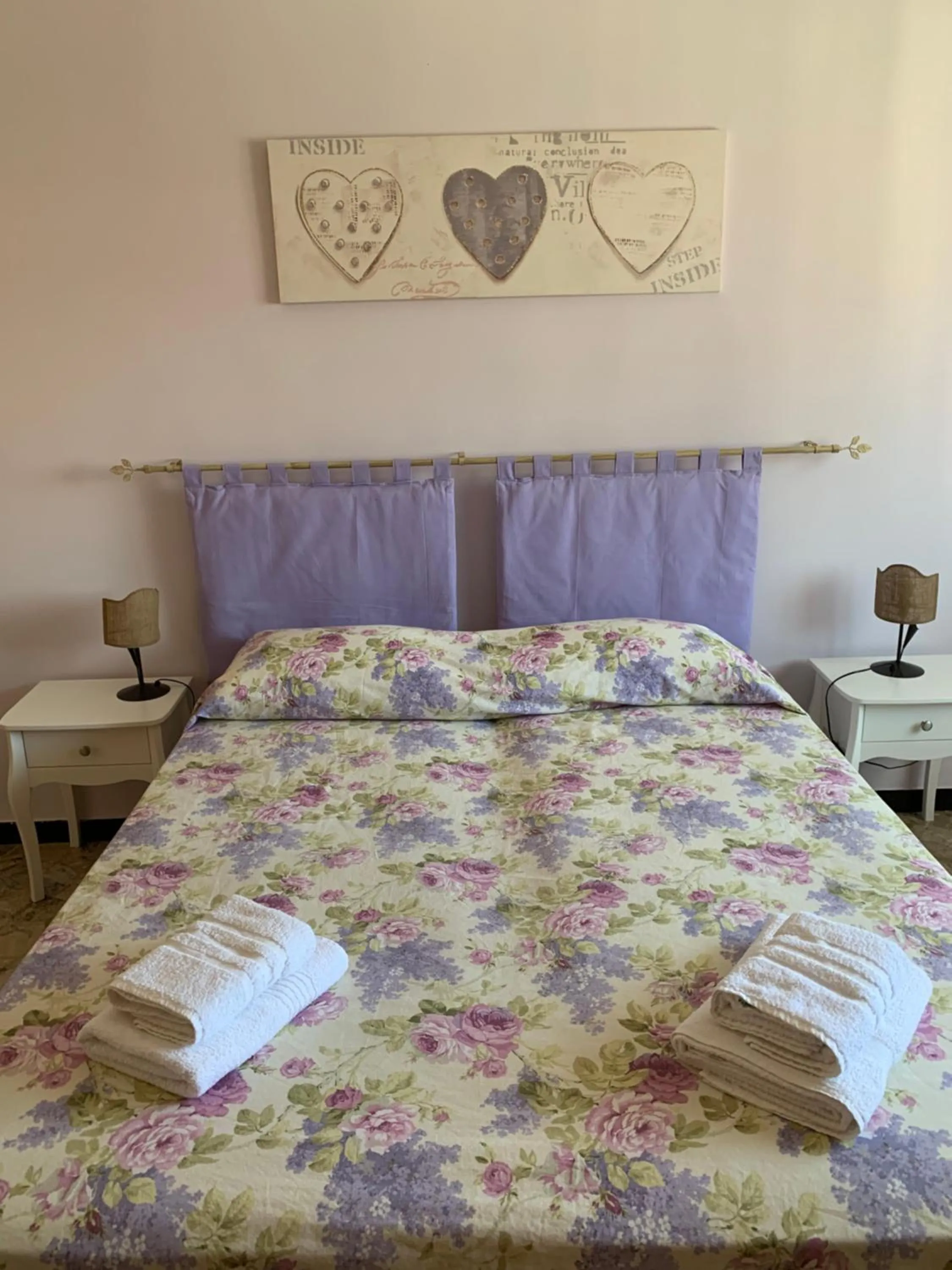 Bedroom in Affittacamere Serravalle Shopping