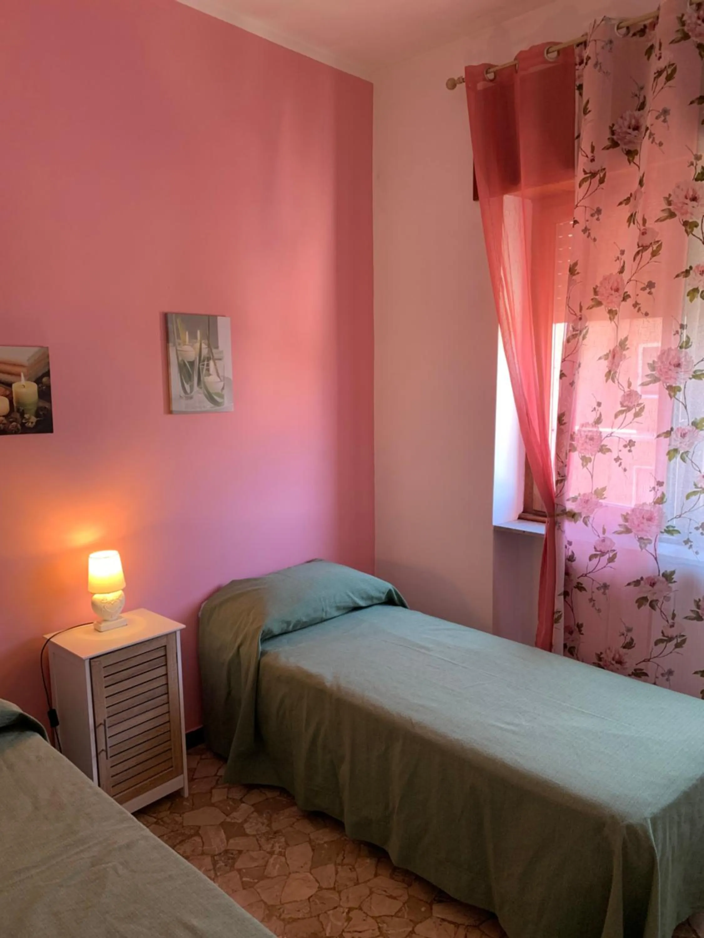 Bedroom in Affittacamere Serravalle Shopping