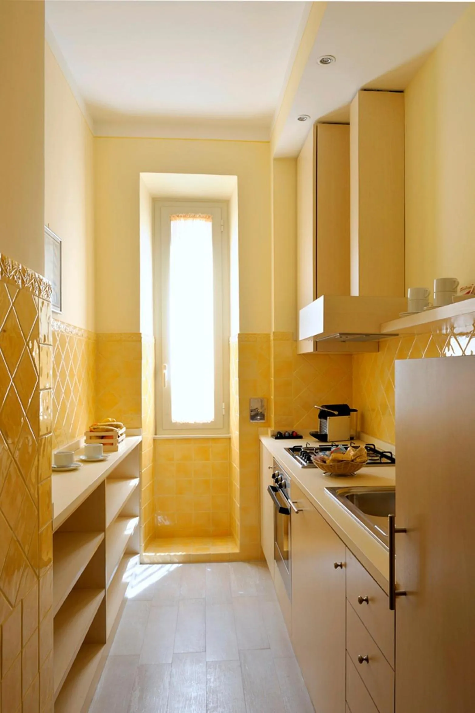 Kitchen or kitchenette in Dea Suite Roma